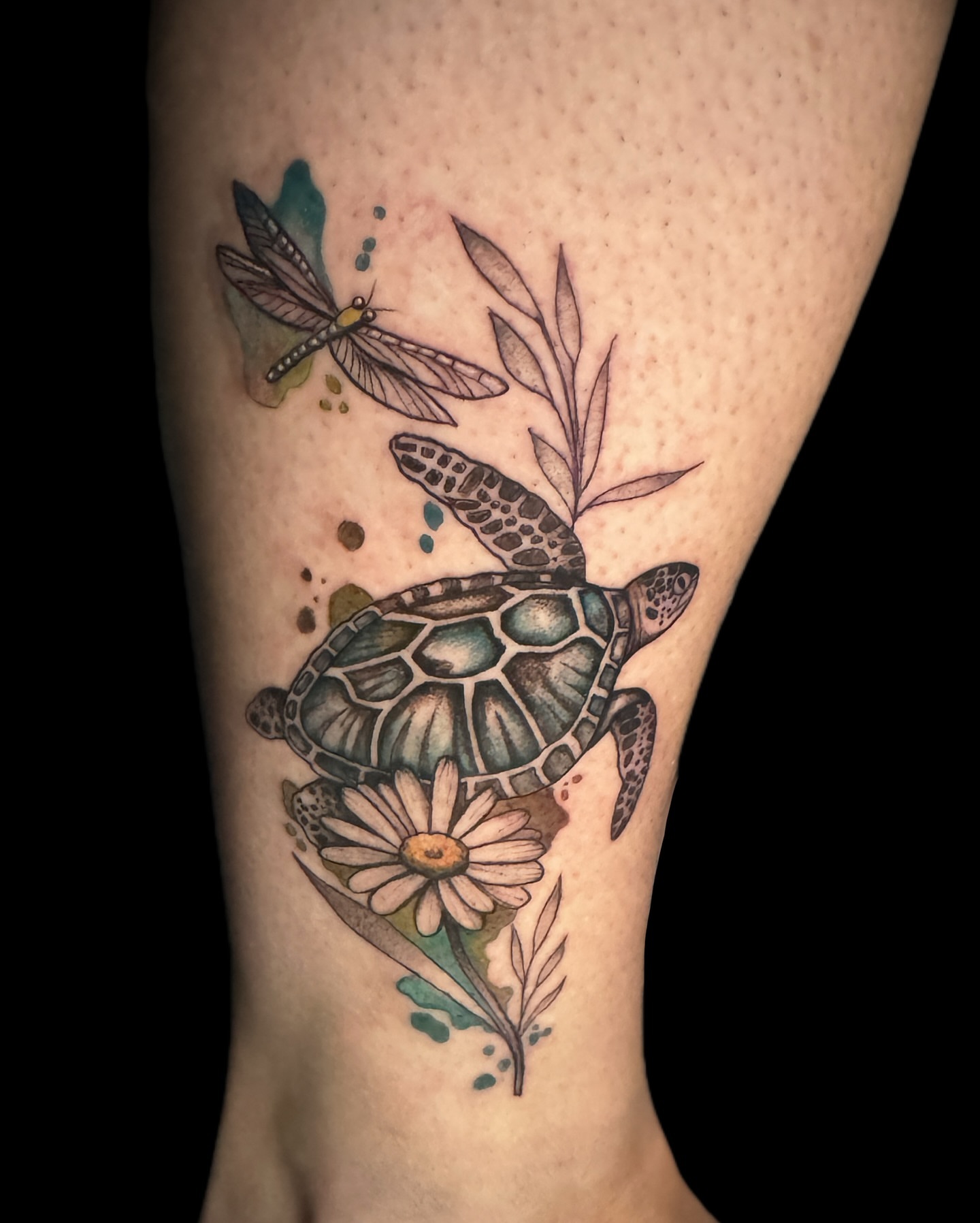 Sea turtle and daisy watercolor tattoo on the forearm by 𝕭𝖆𝖇𝖊𝖔𝖓𝖙𝖍𝖊𝖒00𝖓🌙🪬, Colorado Springs, Colorado