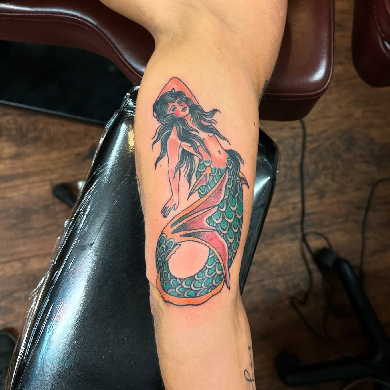 Mermaid American traditional tattoo on the forearm by Jackie