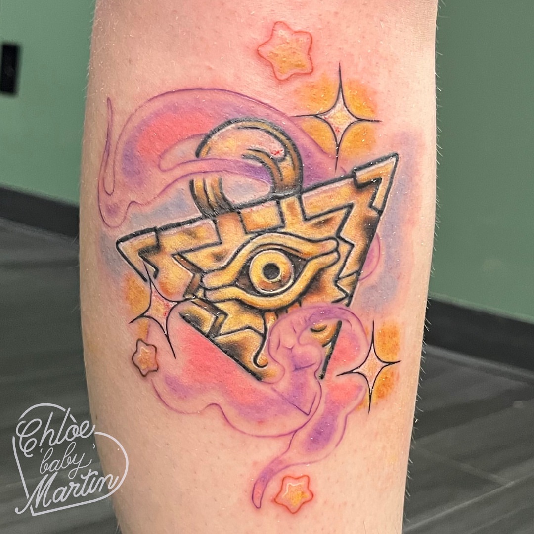 Eye and pyramid geometric tattoo on the forearm by Chloe ‘baby’ Martin