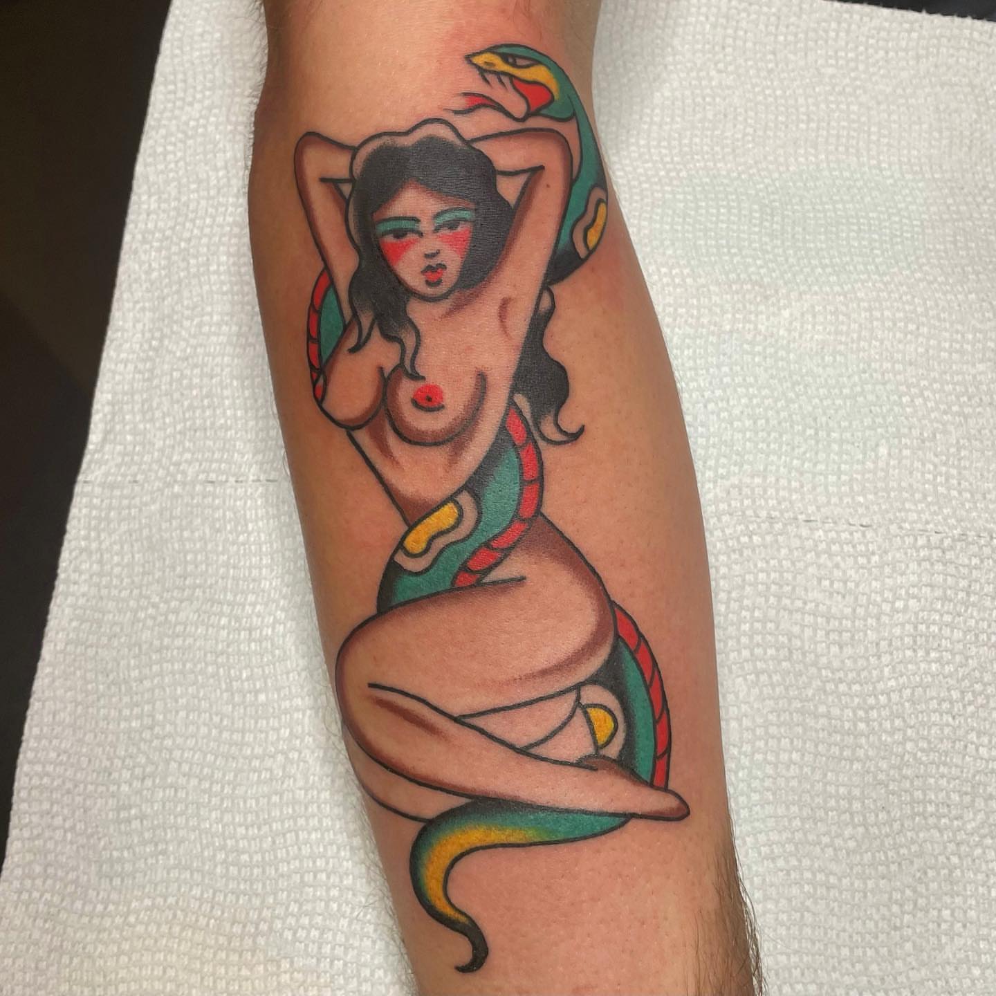 Serpent woman American traditional tattoo on the forearm by nancy❣️