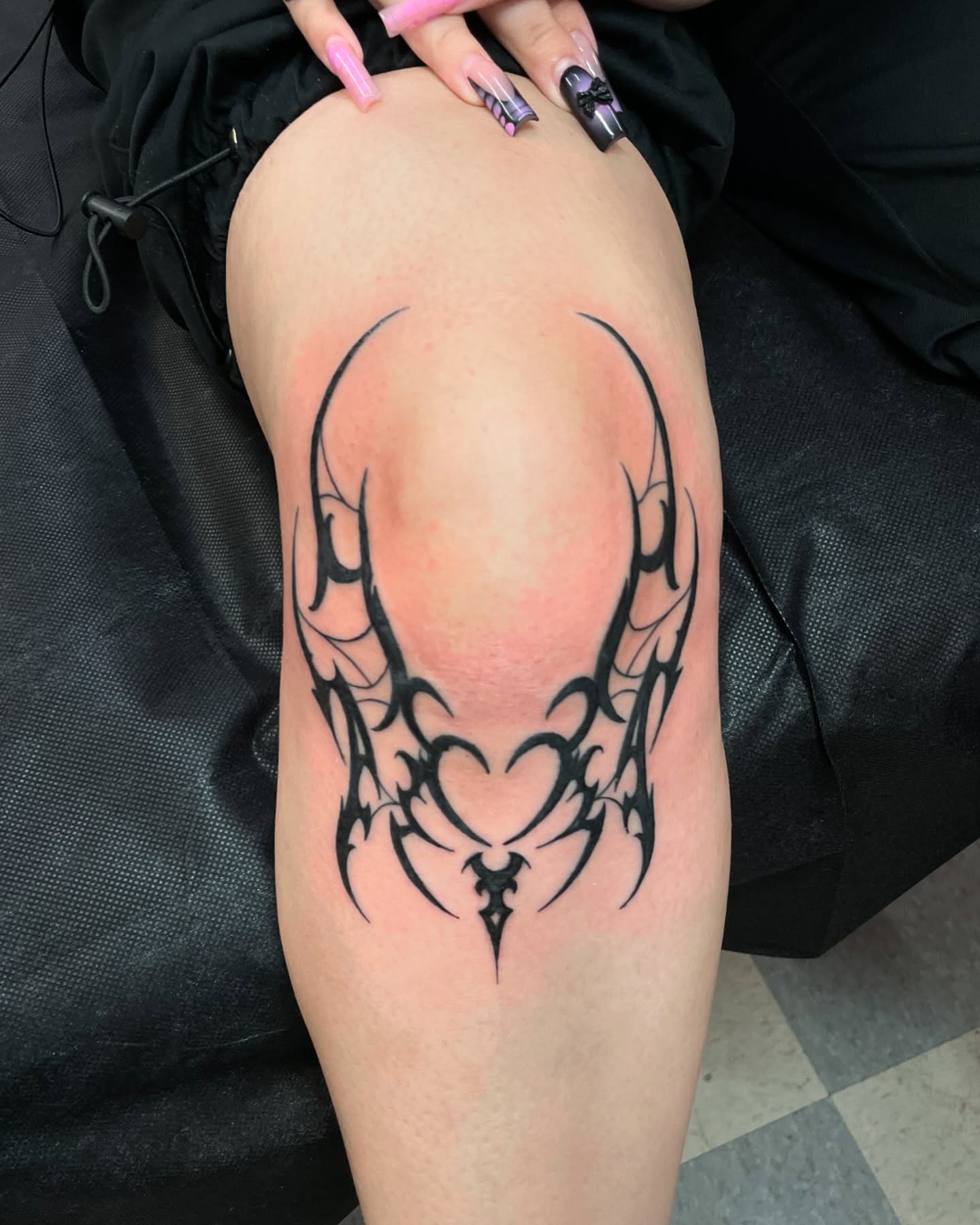 Tribal heart tribal tattoo on the thigh by Manny