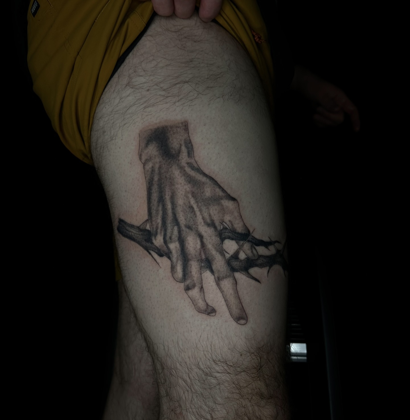 Hand and thorns realism tattoo on the thigh by Jay Morales