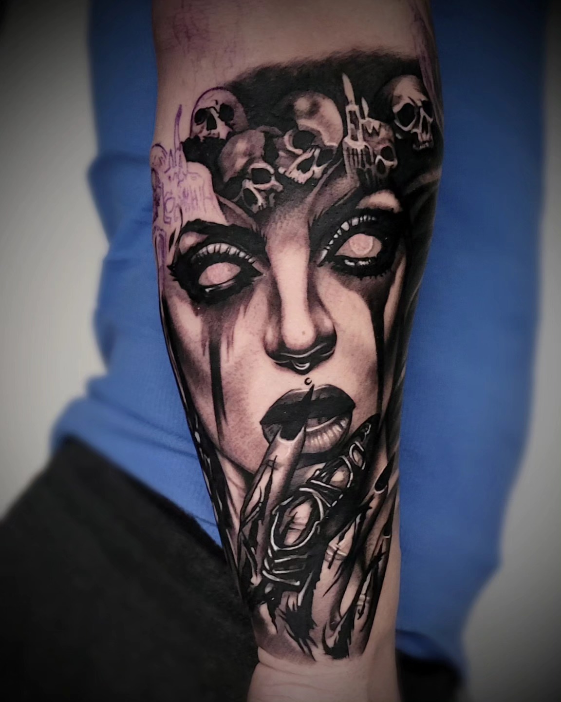 Woman's face realism tattoo on the forearm by Lukasz Olszanski