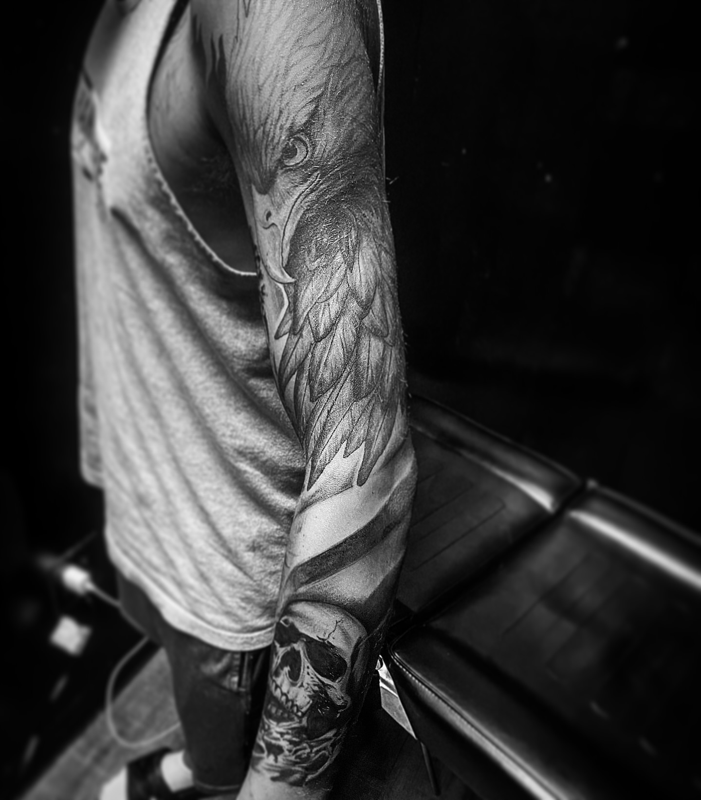 Eagle realism tattoo on the upper arm by Rico Rosario