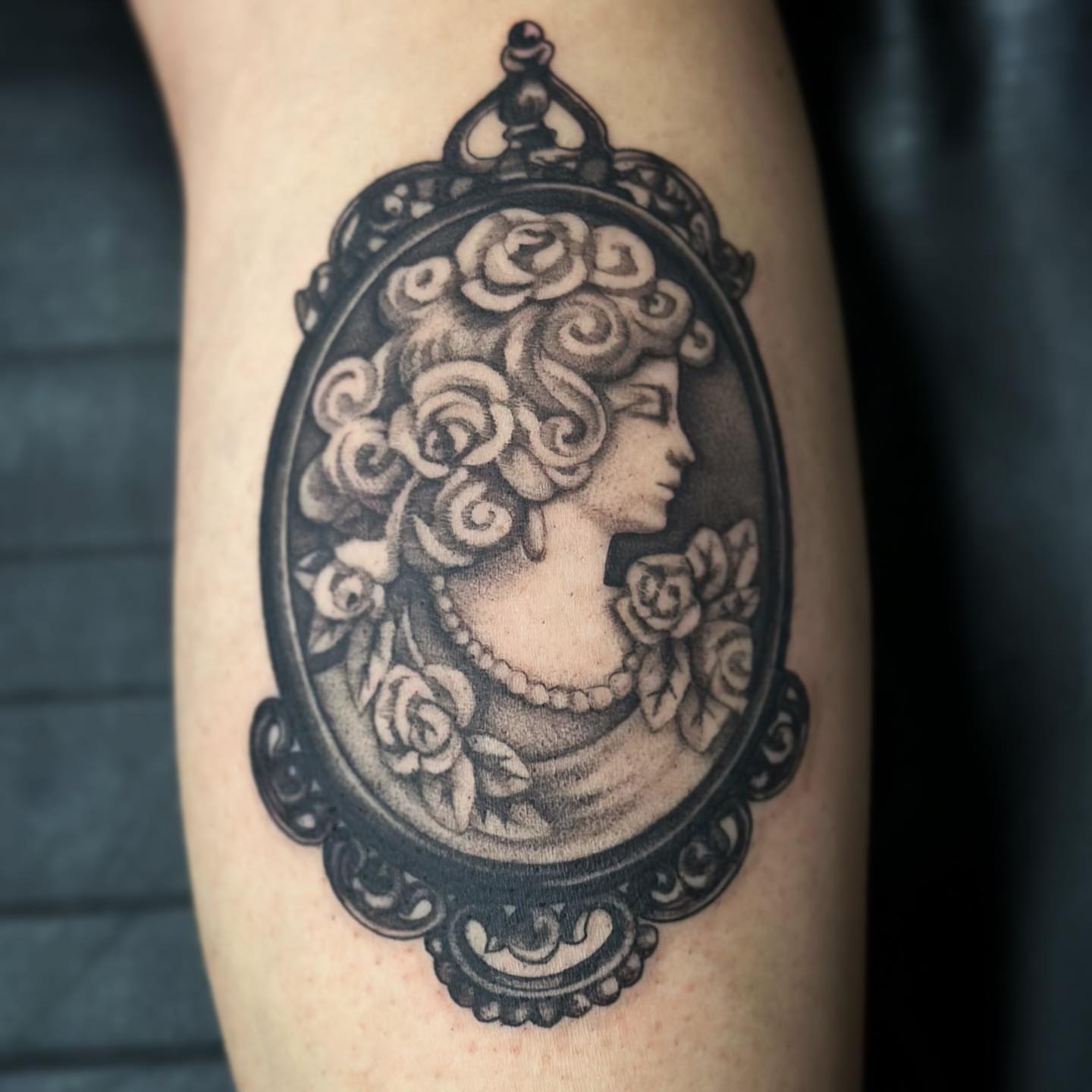 Cabinet portrait realism tattoo on the forearm by audi