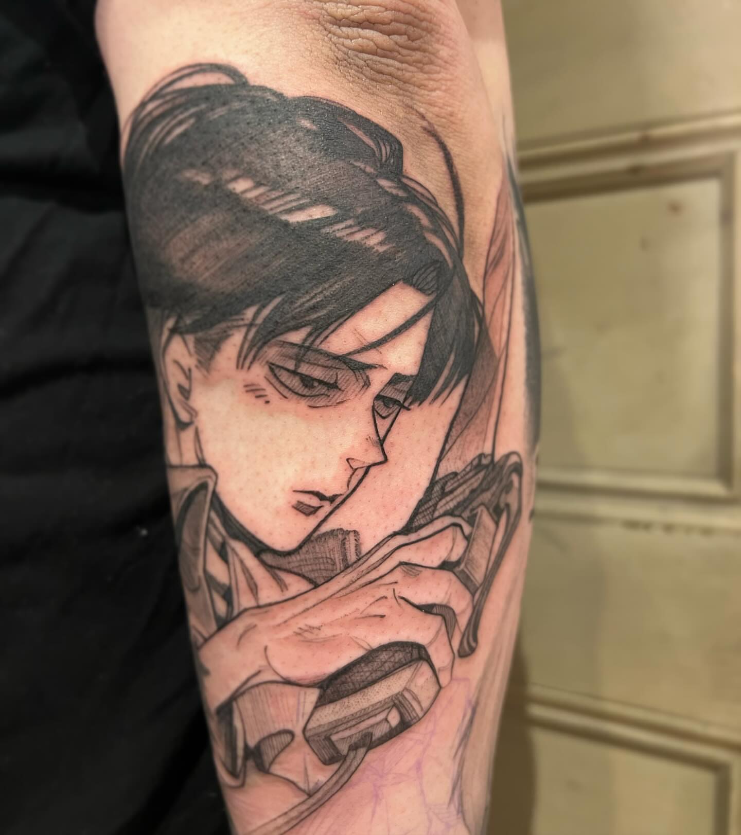 Anime character anime tattoo on the forearm by Rizzie D'Alterio