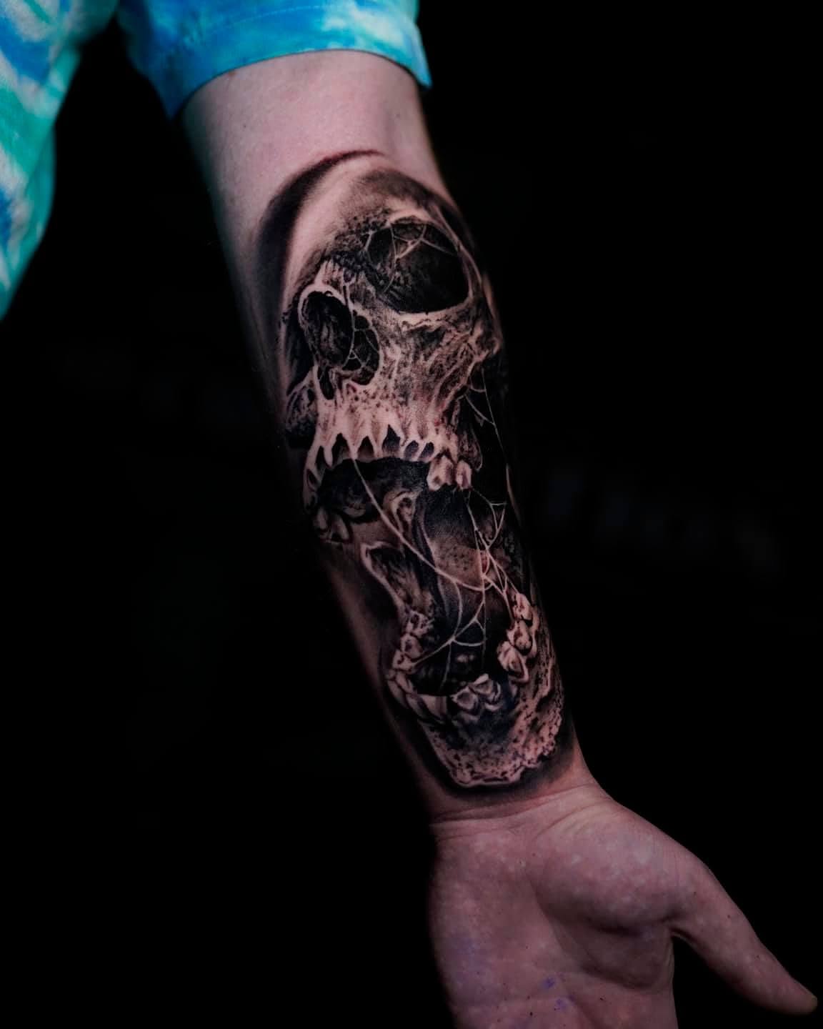 Skull realism tattoo on the forearm by Zacharee Osborn