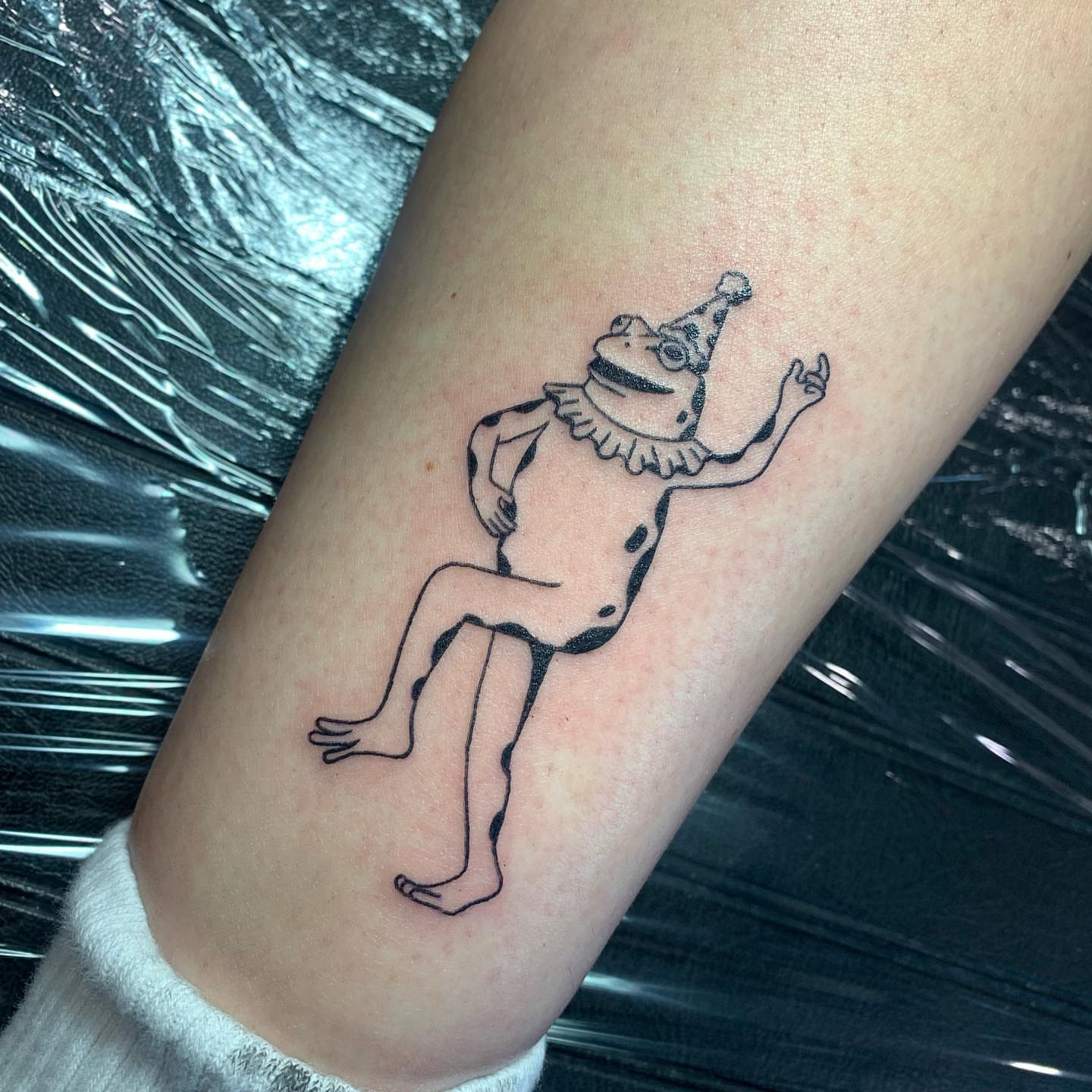 Clown black and grey tattoo on the forearm by s͓̽a͓̽w͓̽n͓̽j͓̽a͓̽