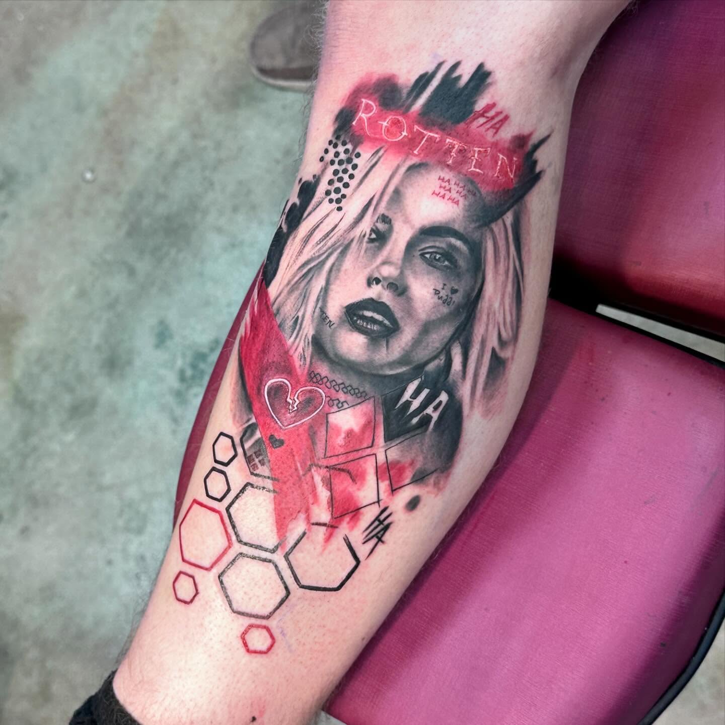Harley Quinn realism tattoo on the forearm by Shawn Cook