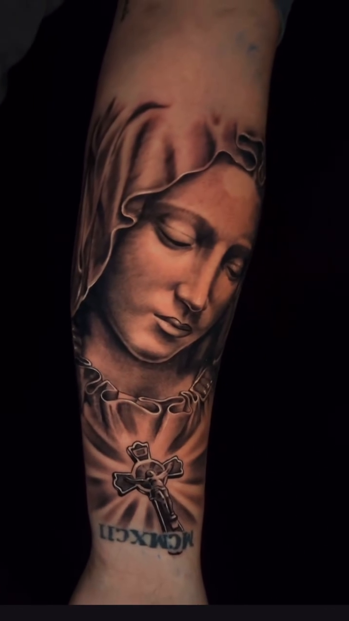 Virgin Mary with cross realism tattoo by Xando