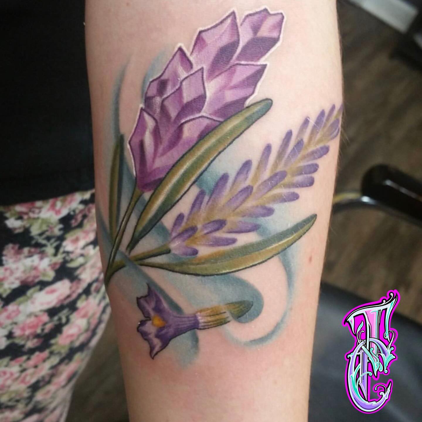 Lavender bouquet watercolor tattoo on the forearm by Thea Curlee