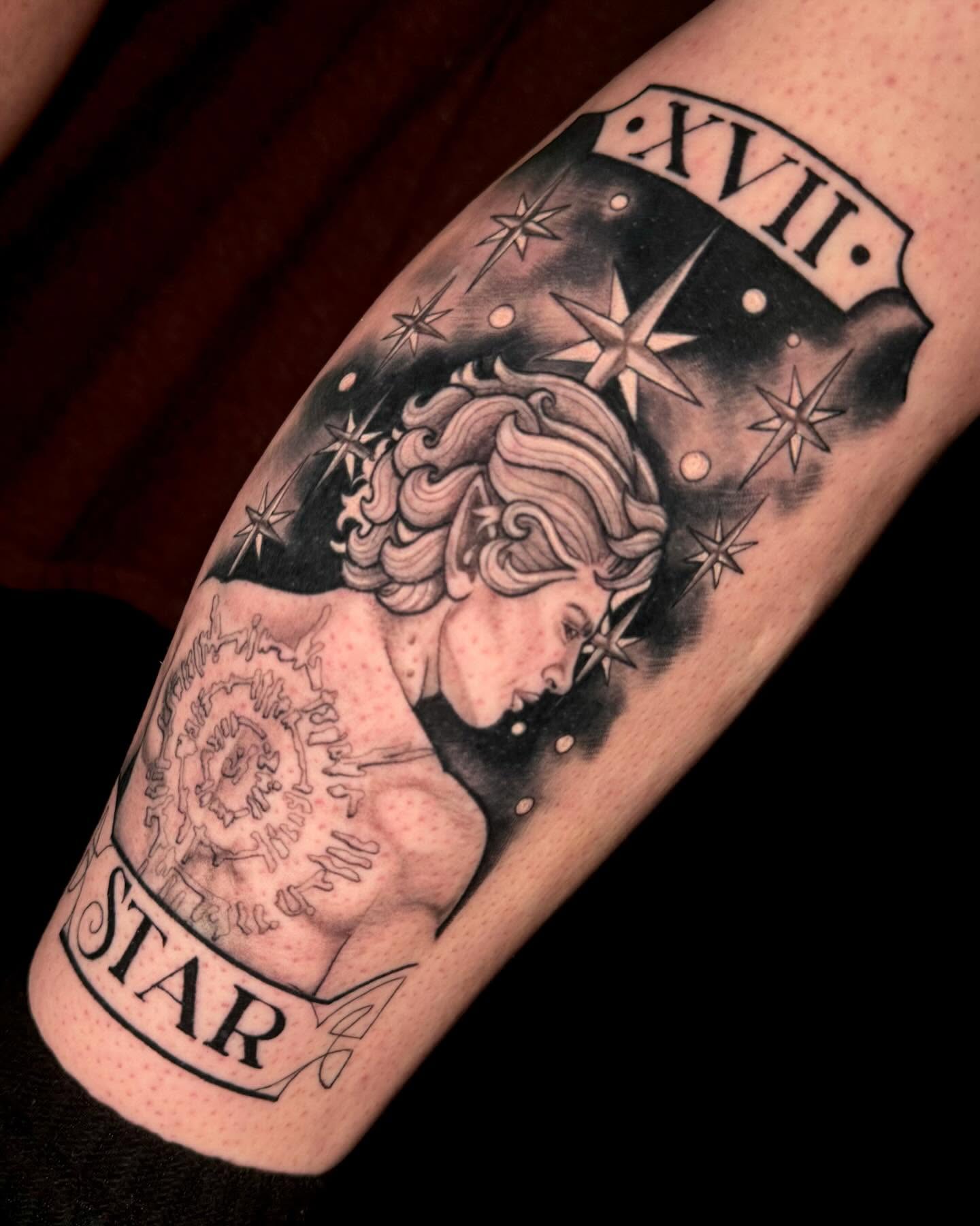 Star realism tattoo on the forearm by Amber