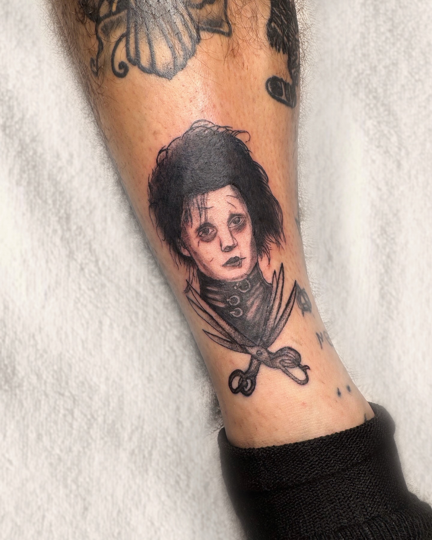 Edward Scissorhands dark realism tattoo on the forearm by Tattoo Artist ⚔️ San Diego, CA
