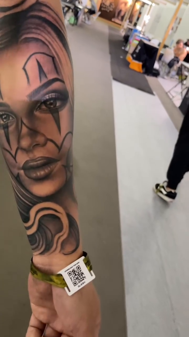 Woman's face with clown makeup realism tattoo by Richie Moreno lll