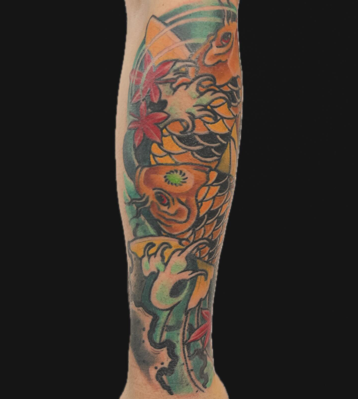 Koi fish and maple leaves japanese irezumi tattoo on the forearm by Will Eagle
