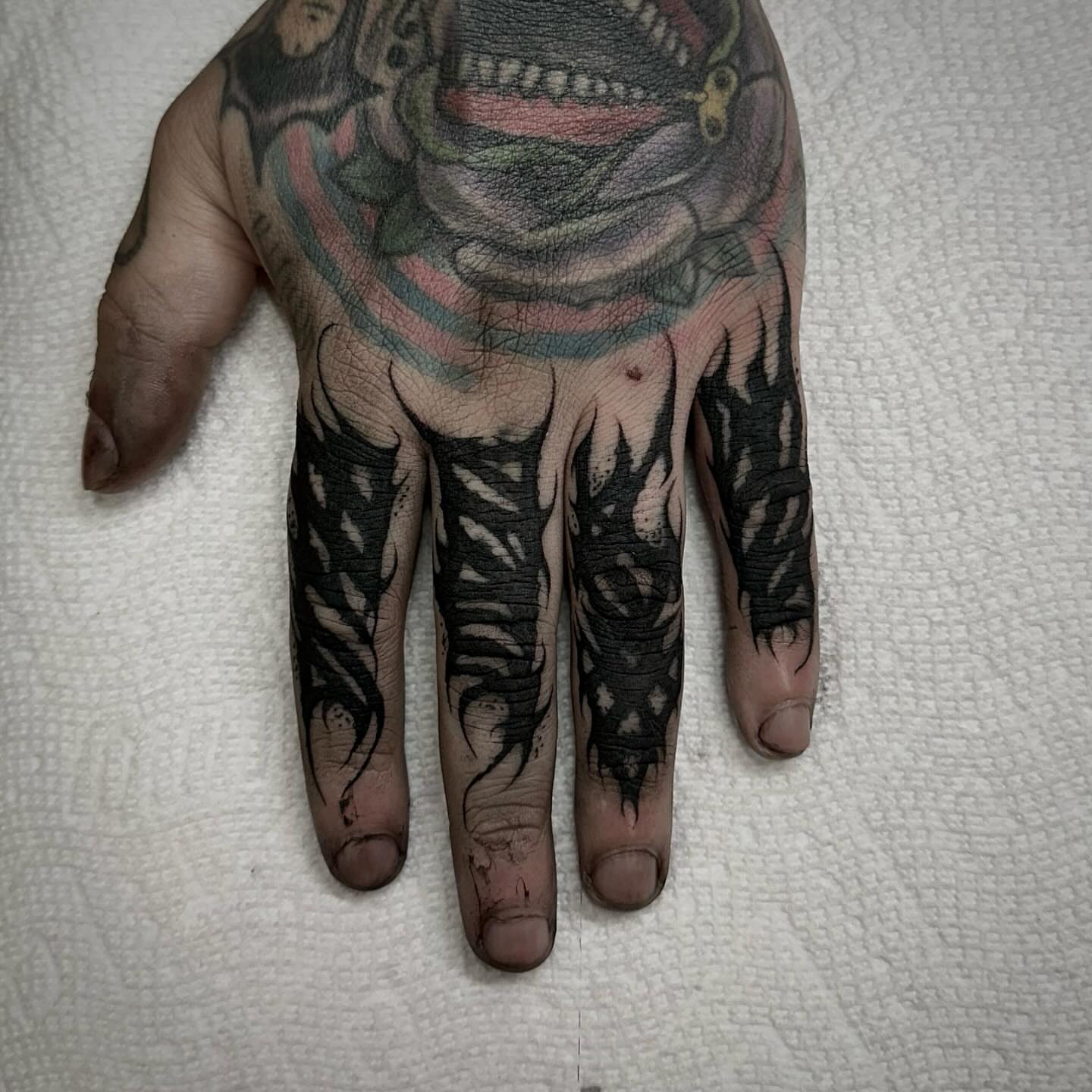 Hand with detailed tattoo black and grey tattoo on the hand by Emily‹𝟹