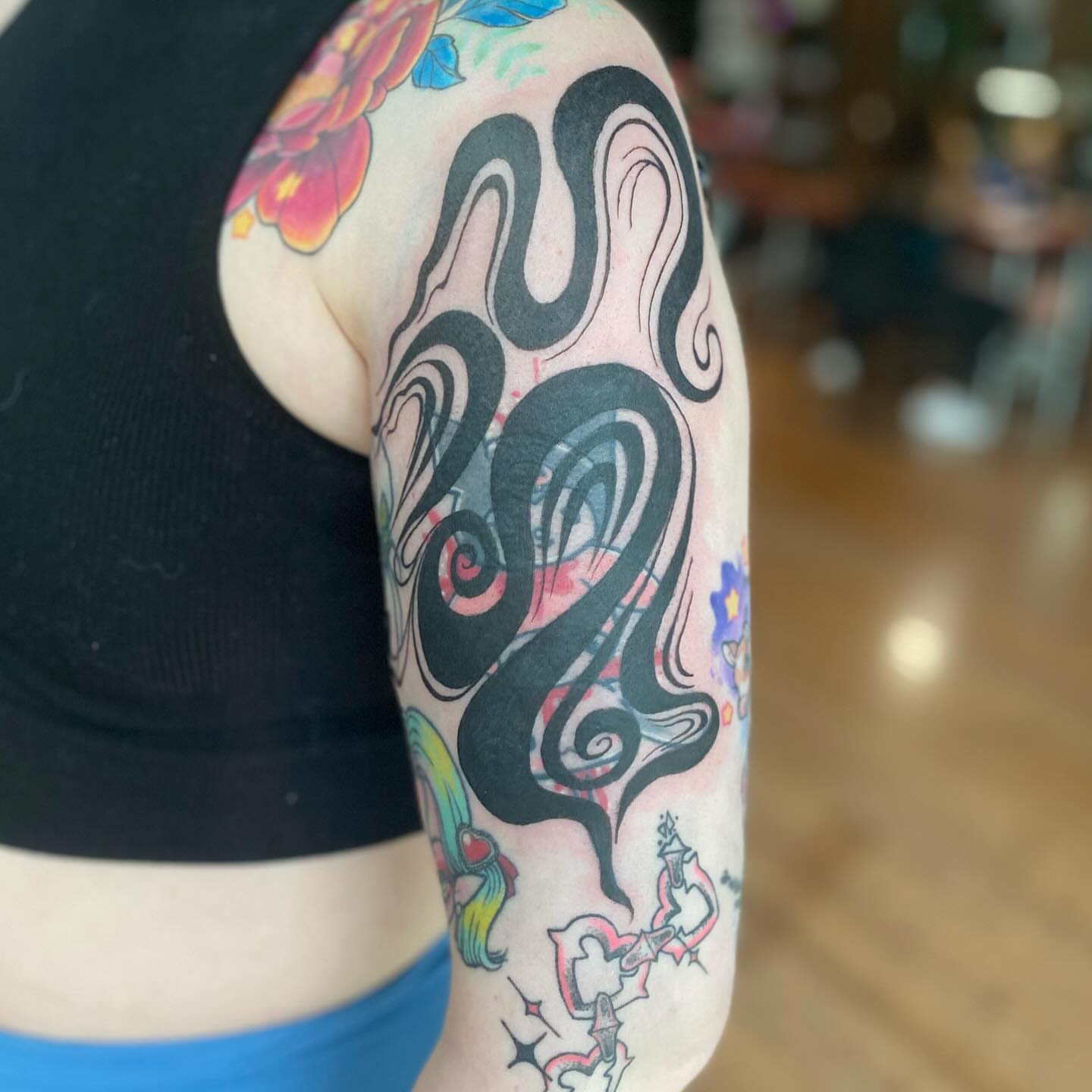 Octopus American traditional tattoo on the upper arm by Maddy ⁂, Murfreesboro, Tennessee