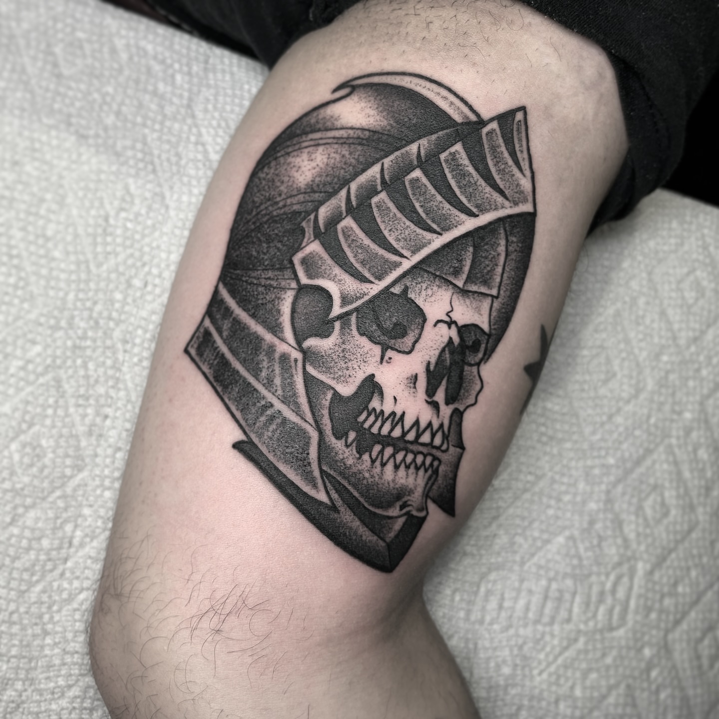 Skull with helmet dotwork tattoo on the forearm by Beejay Tattoo Artist San Antonio Amarillo TX