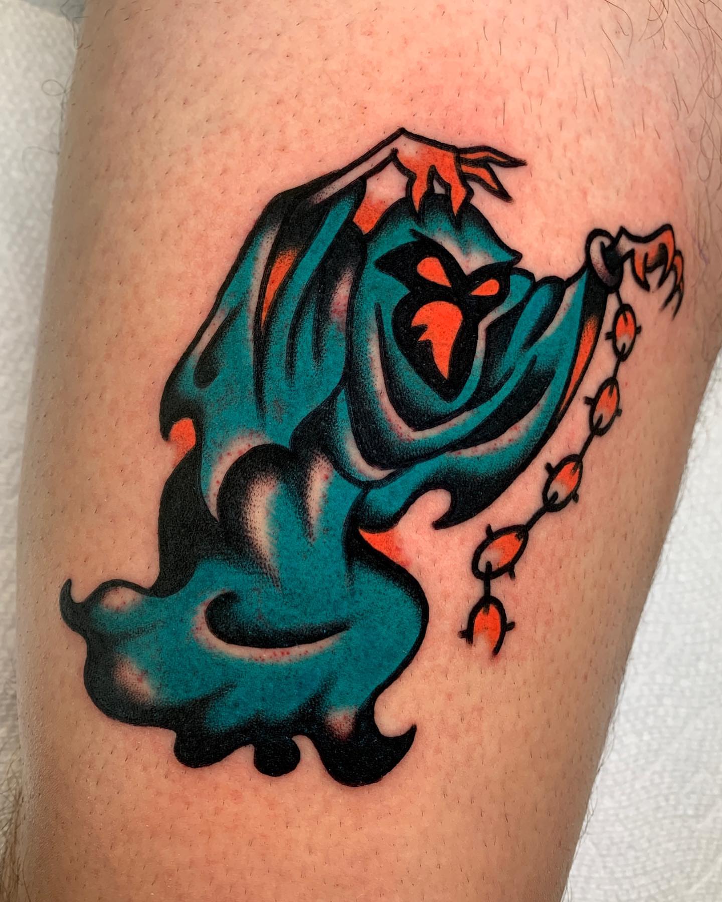 Ghostly figure American traditional tattoo on the thigh by Zachary - Traditional Tattoo Artist