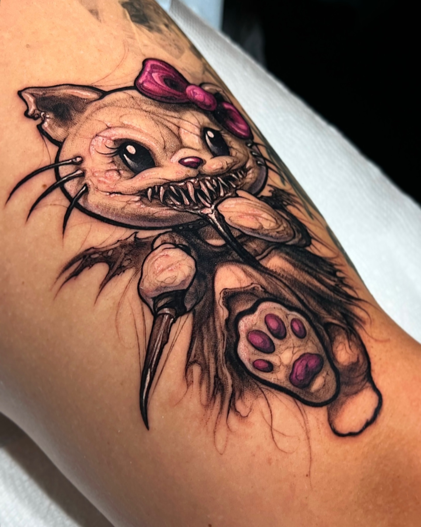 Cat realism tattoo on the forearm by Brandon Herrera