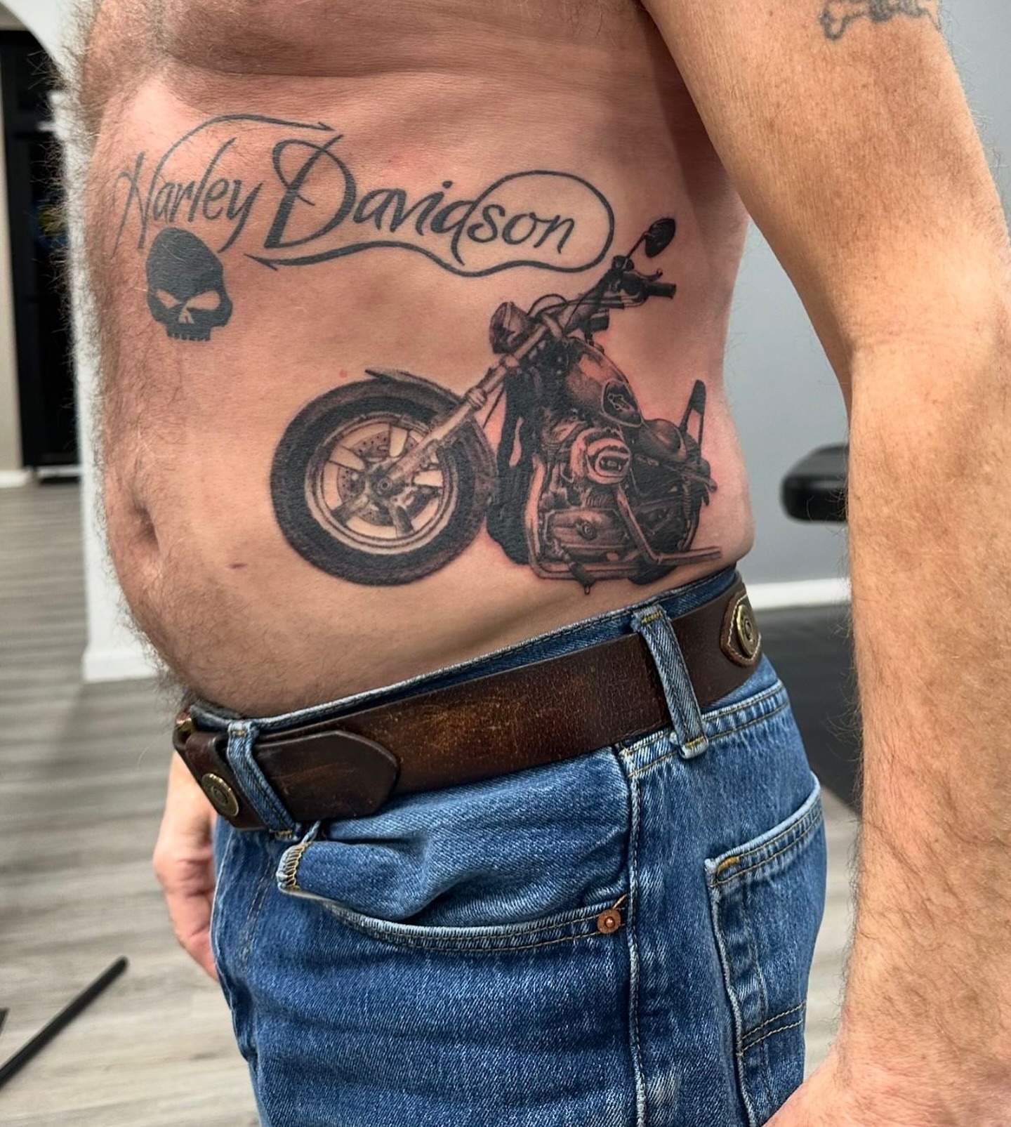Motorcycle black and grey tattoo by Kelsey Zussman