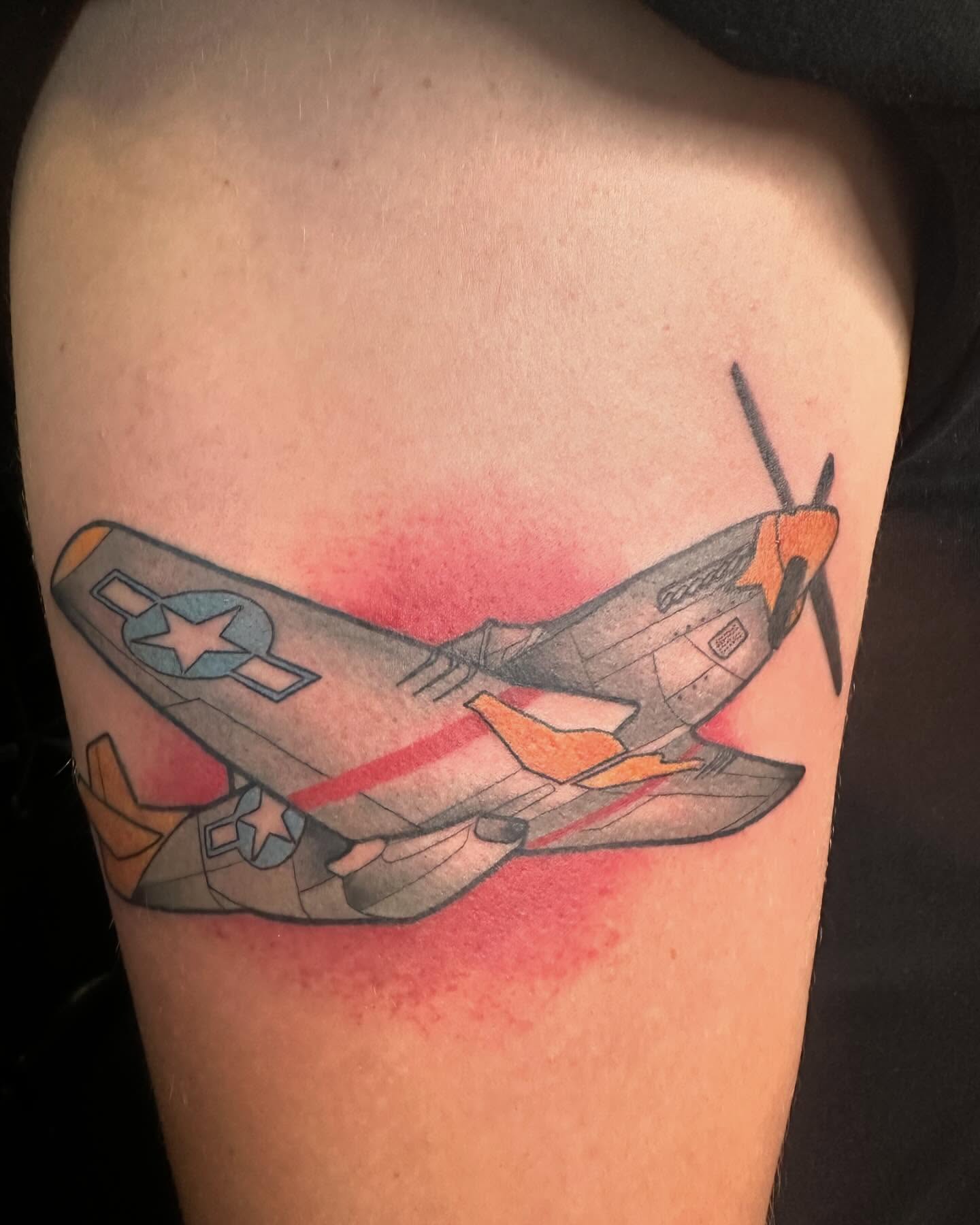 Military aircraft realism tattoo on the shoulder by Shelby Raia