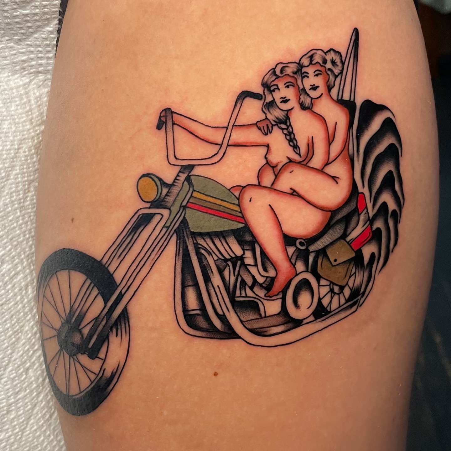 Motorcycle with two women American traditional tattoo on the thigh by Toulouse Noble, Portland, Oregon