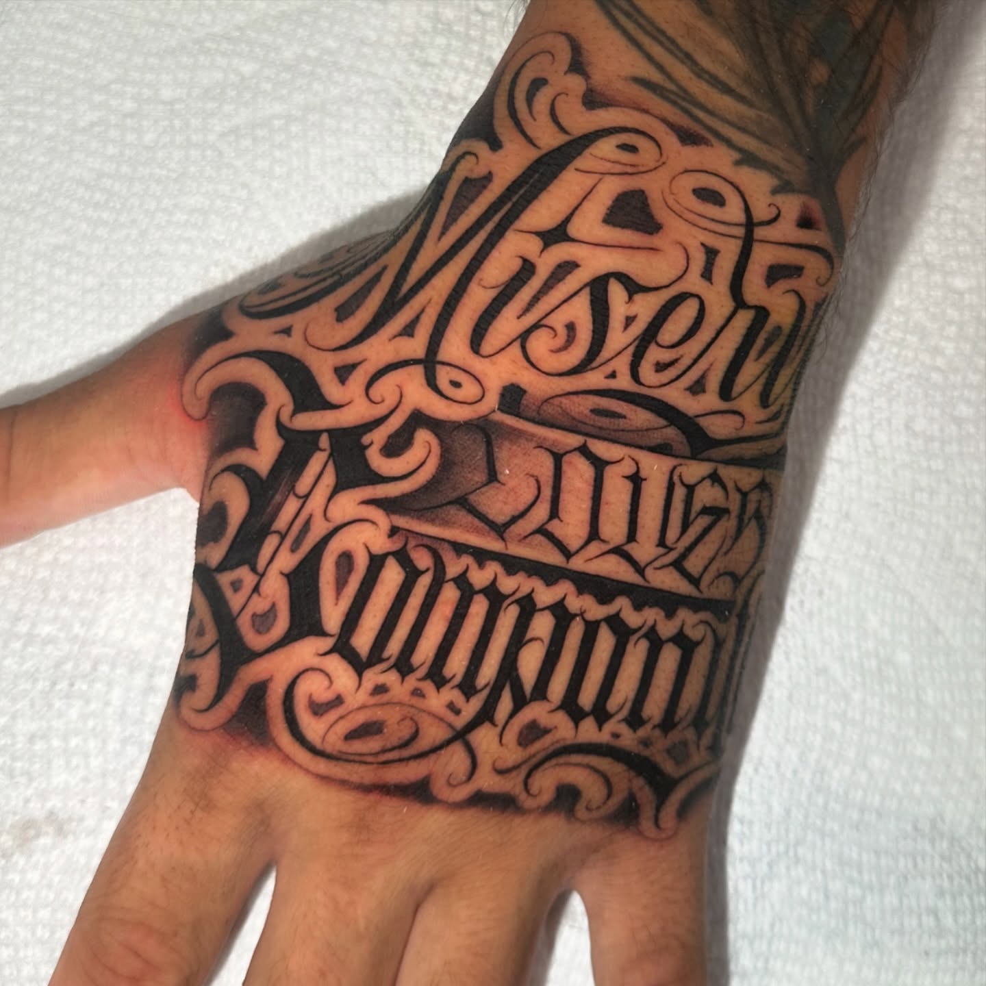 Script lettering lettering script tattoo on the forearm by Atlanta Tattoo Artist, Atlanta, Georgia