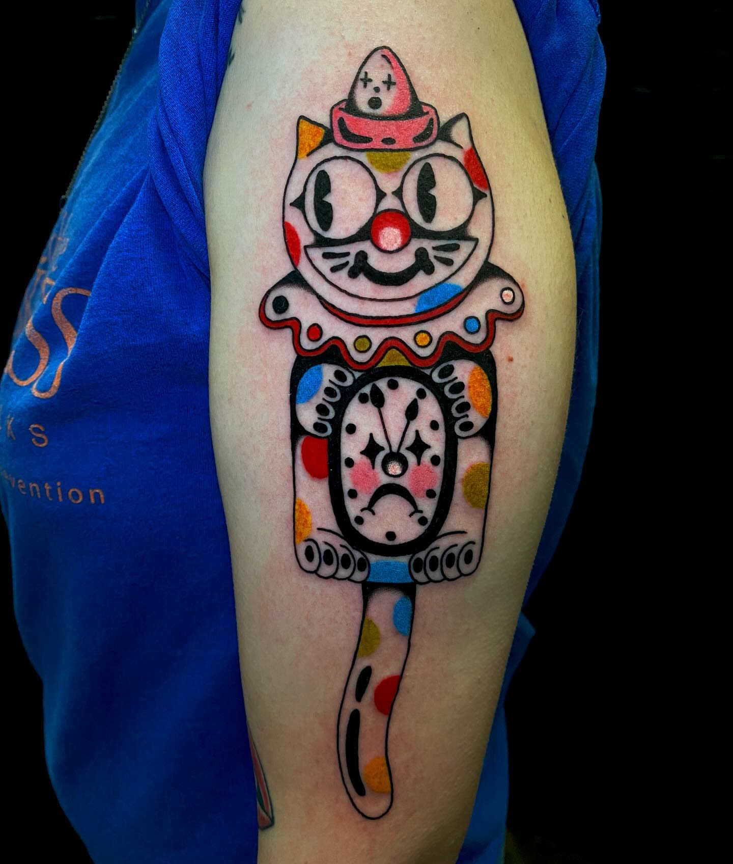 Clown cat trash polka tattoo on the forearm by Justin R. Mitchell, Fort Worth, Texas