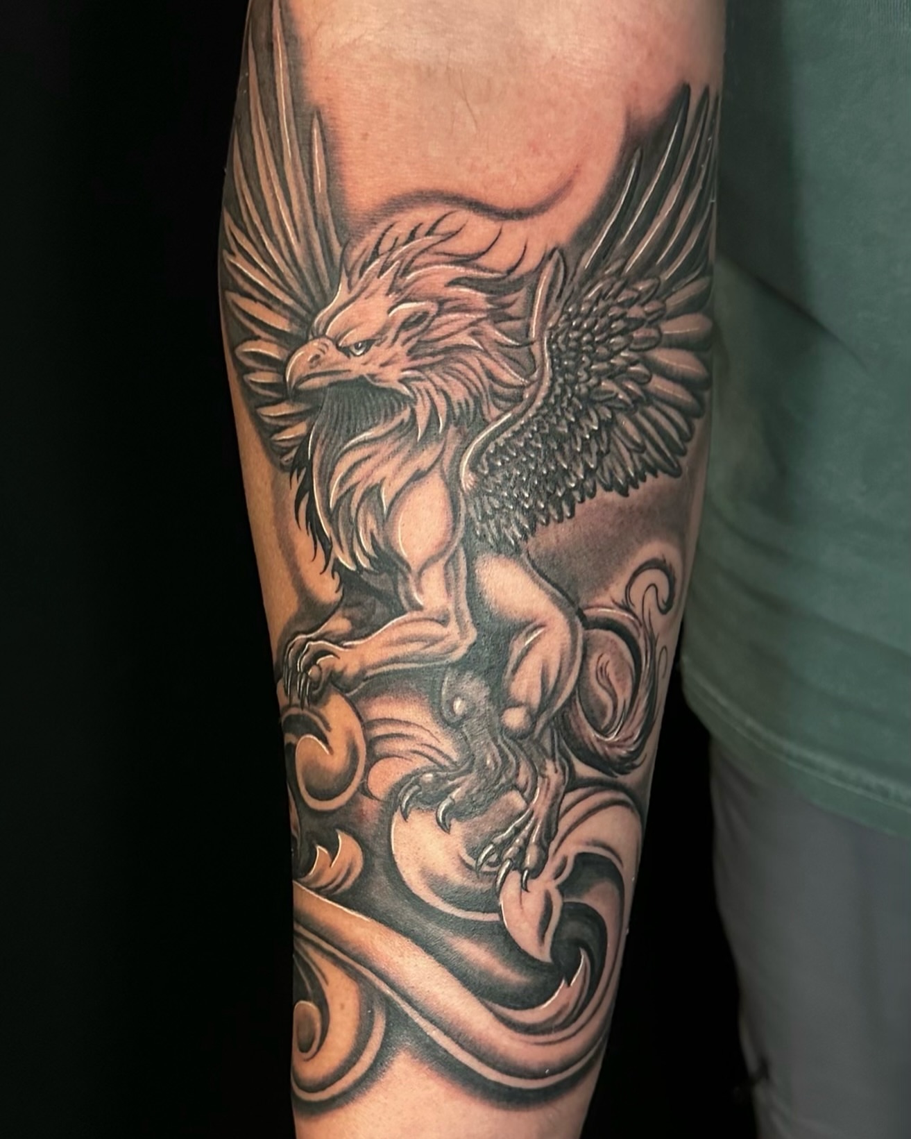 Phoenix black and grey tattoo on the forearm by las vegas tattoo artist