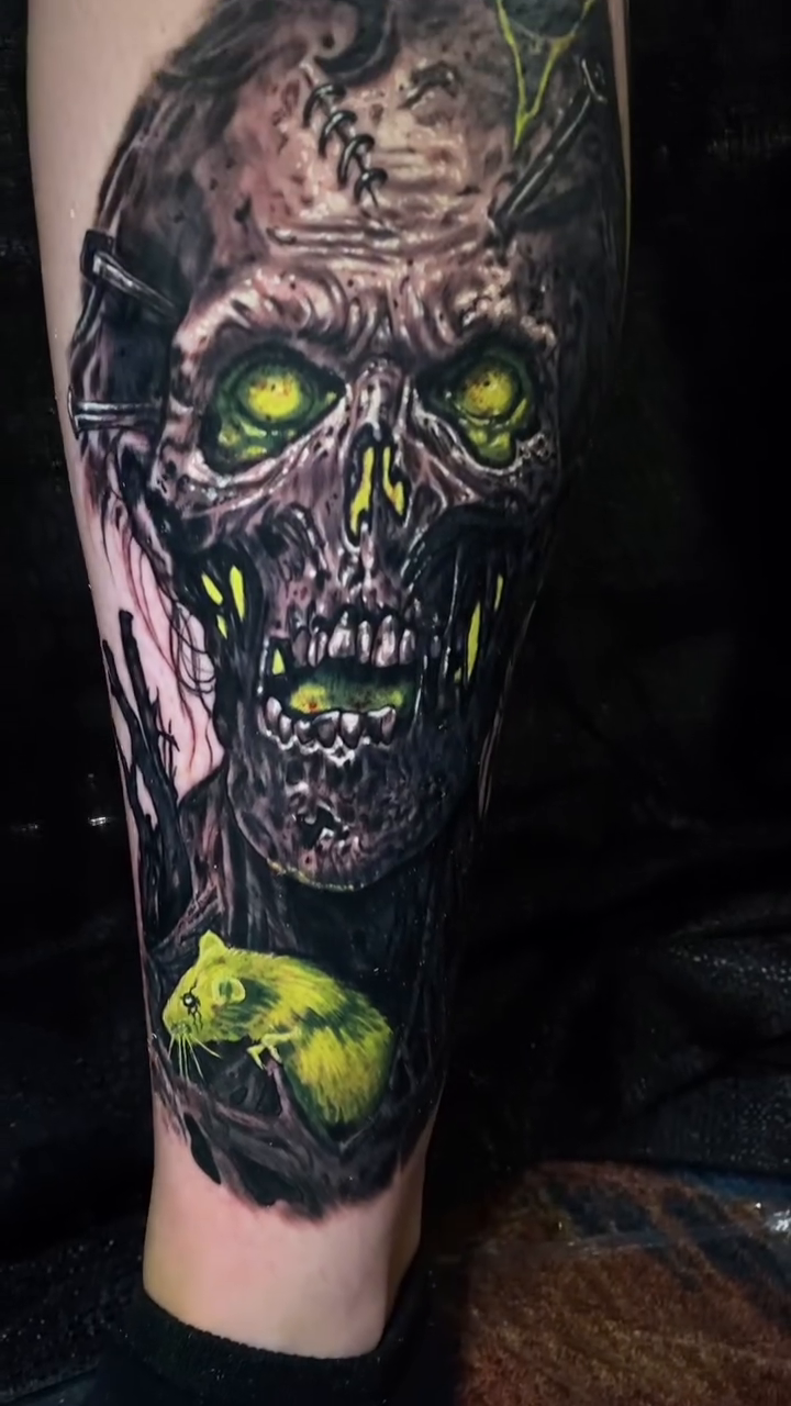 Zombie head realism tattoo by Caitlyn Campbell