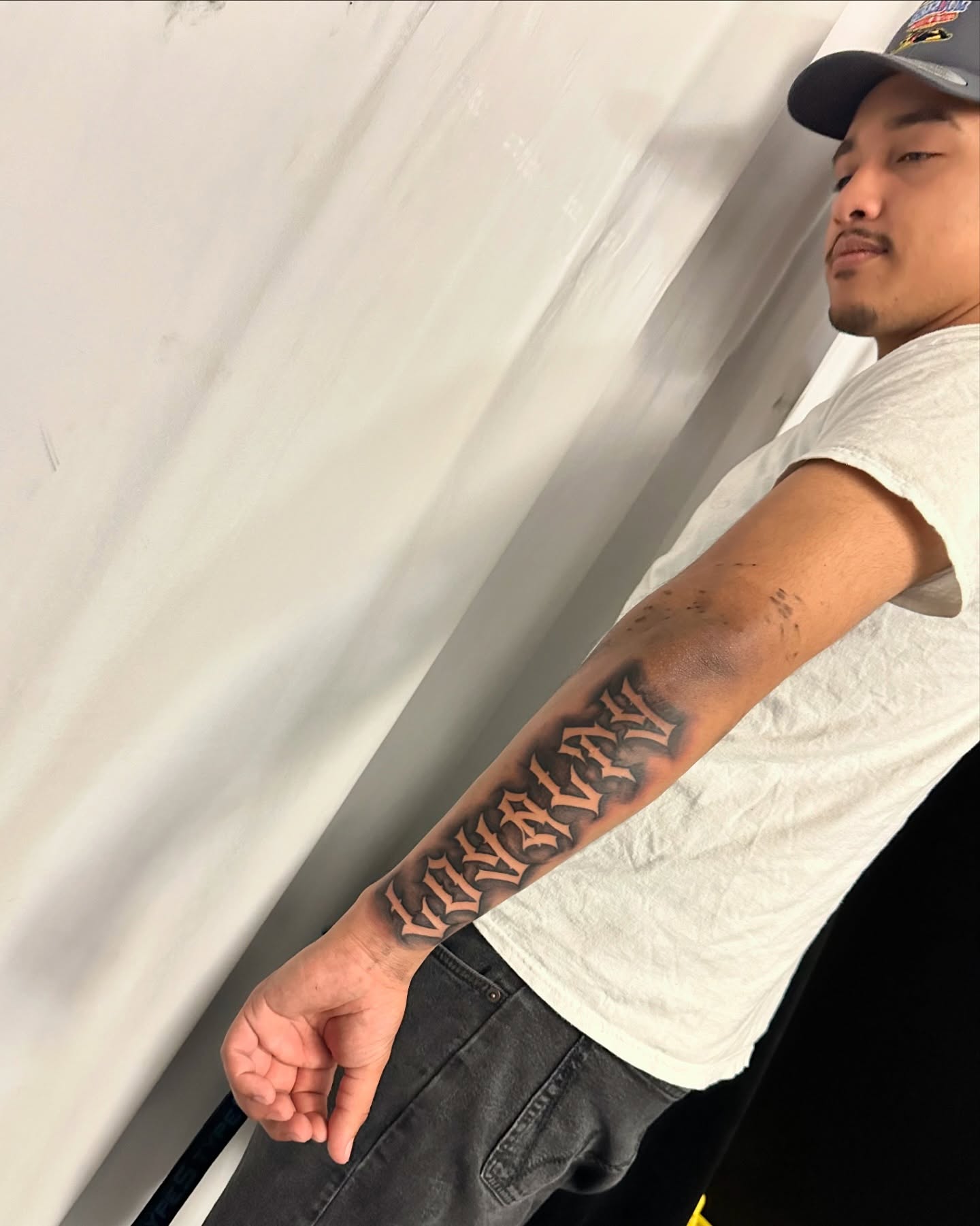 Script lettering lettering script tattoo on the forearm by Emma Sferdian🇷🇴