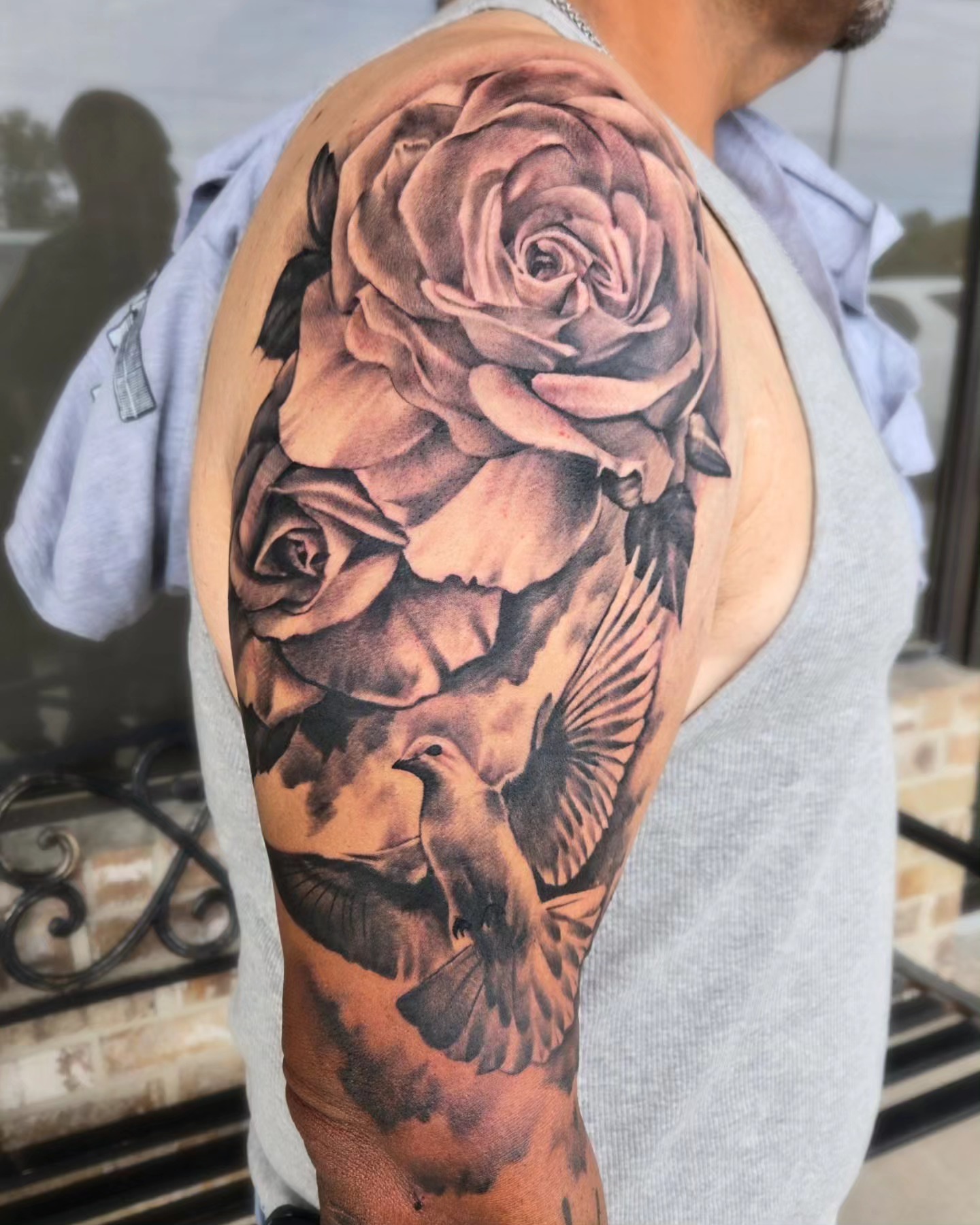 Rose and bird realism tattoo on the shoulder by KP or Kaitlynn Perkins