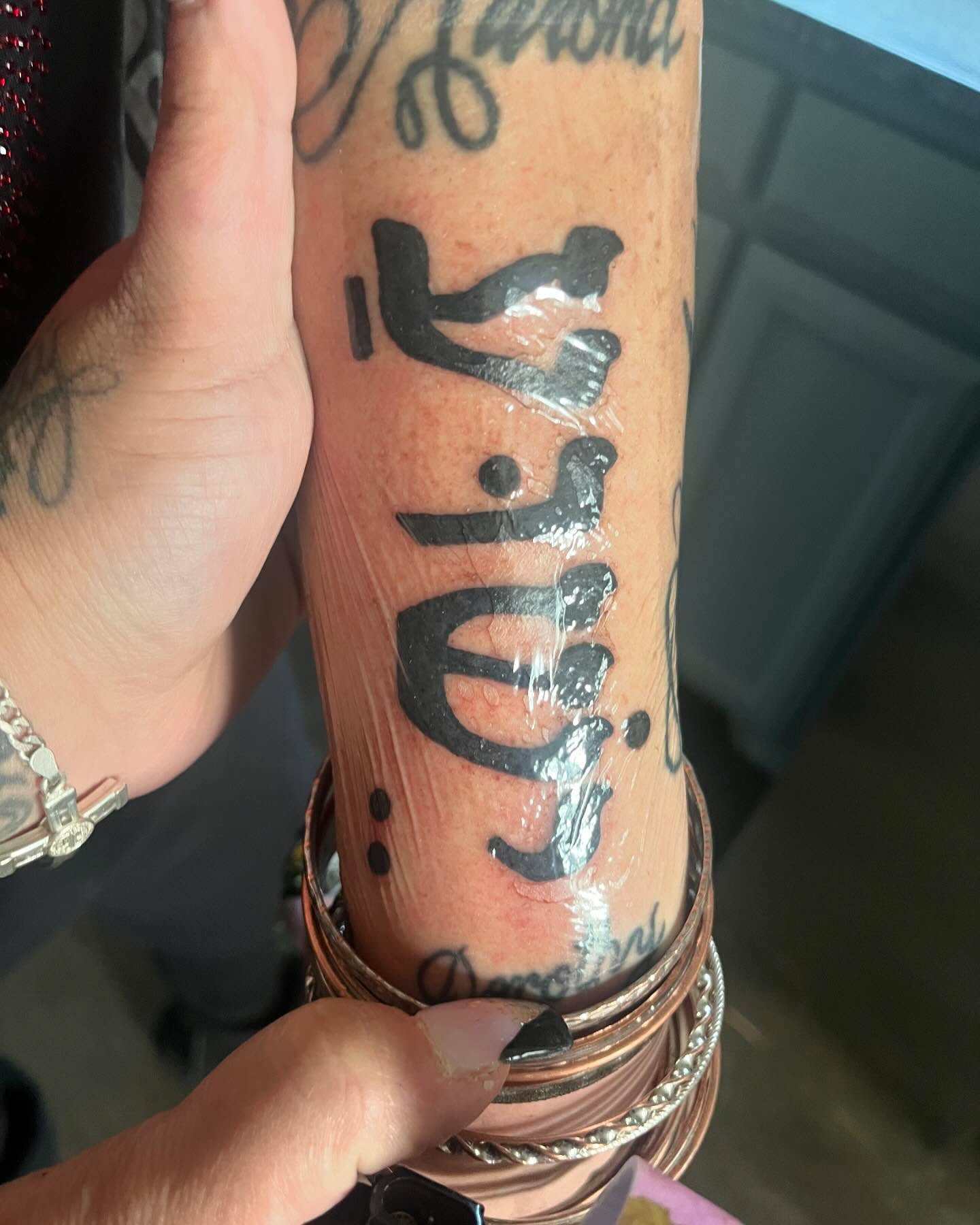 Arabic calligraphy lettering script tattoo on the forearm by Anna DeLuna