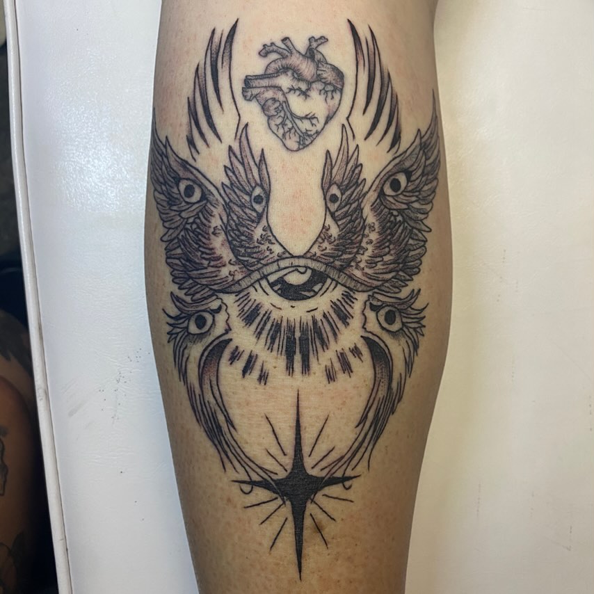 Angelic figure with anatomical heart realism tattoo on the calf by MD Ariel🦷