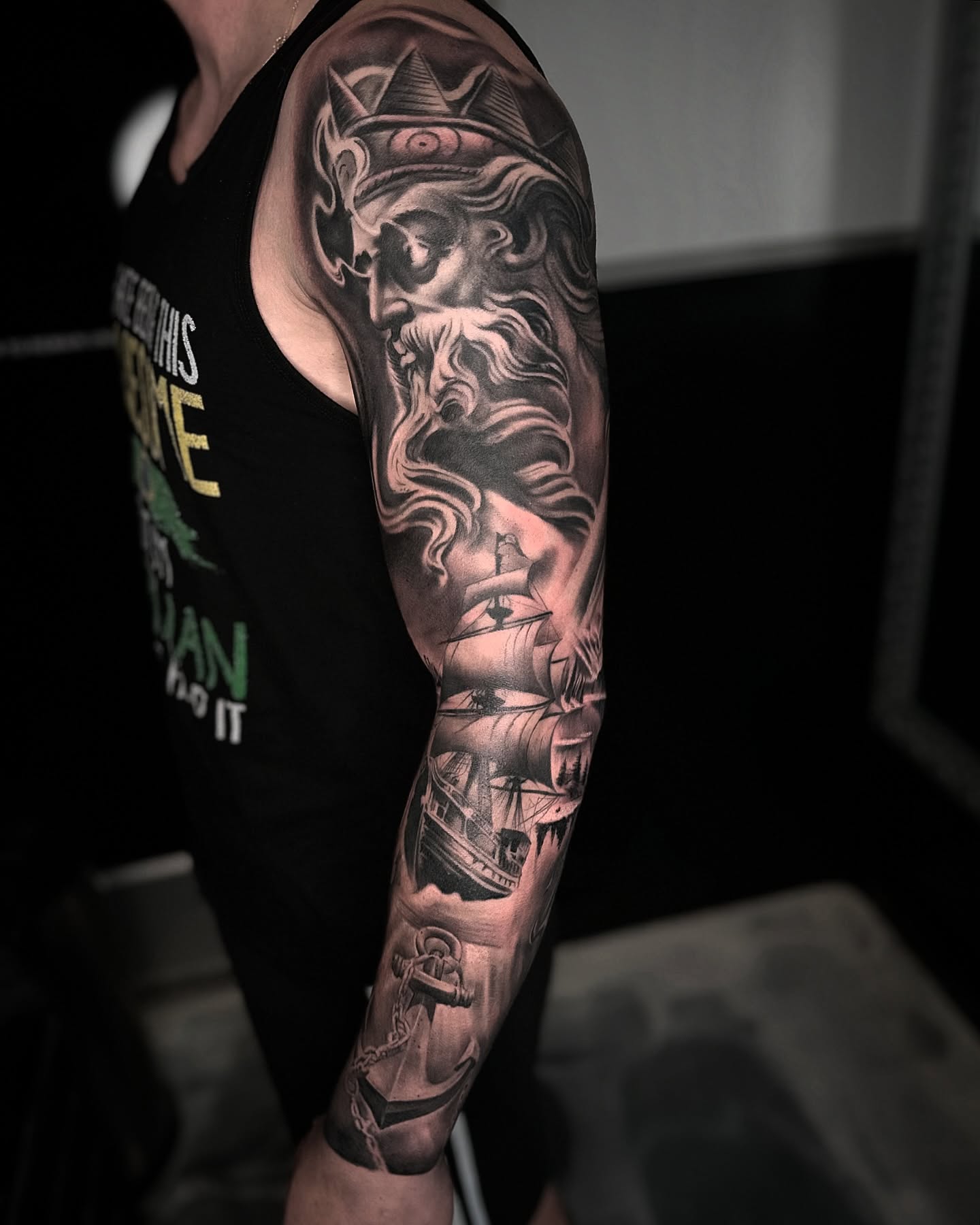 King with ship realism tattoo on the forearm by Tattoo Artist - the Goat