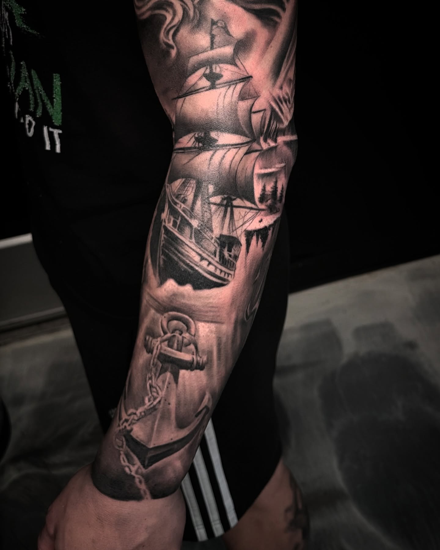 Ship and anchor realism tattoo on the forearm by Tattoo Artist - the Goat