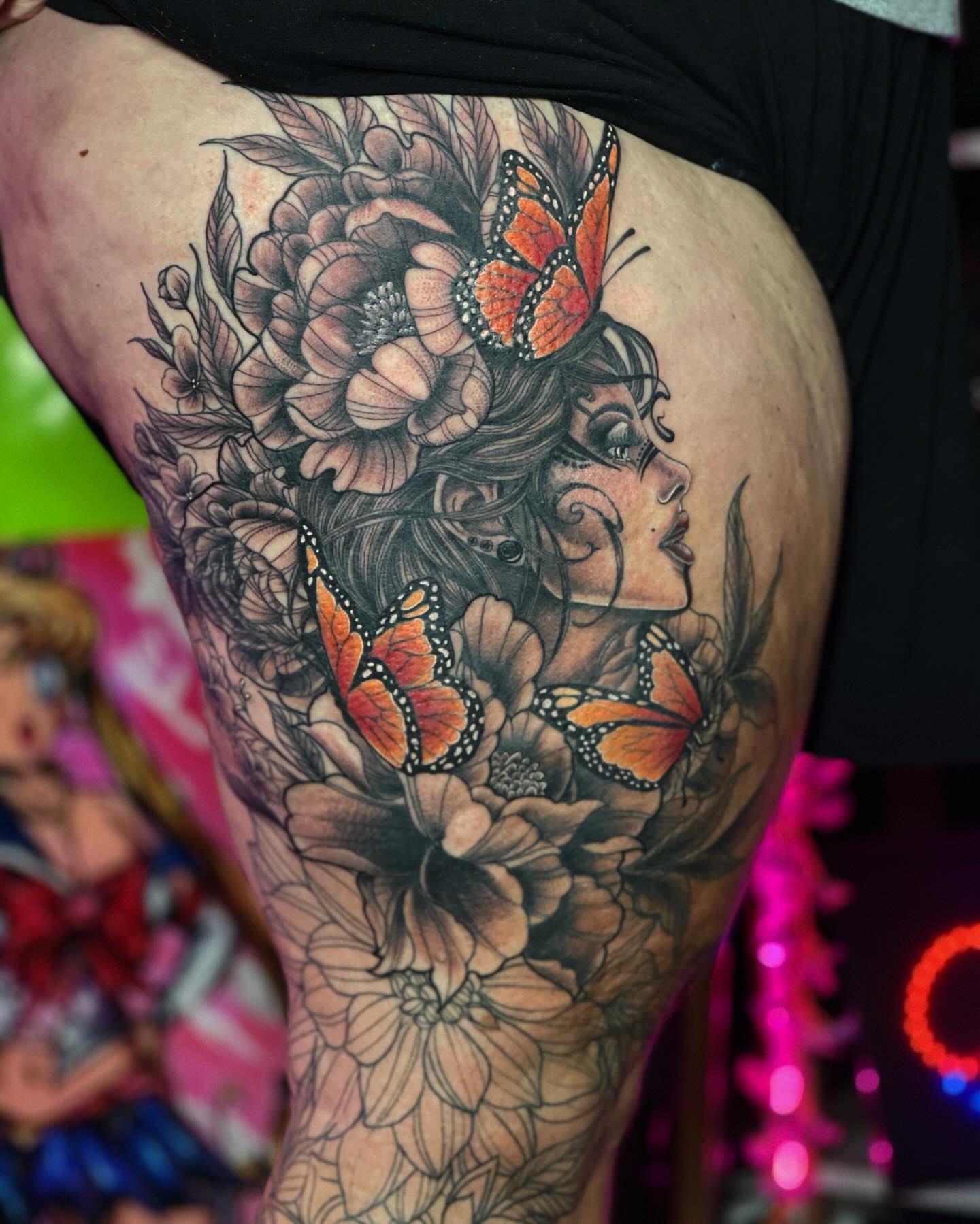 Woman with butterflies realism tattoo on the thigh by Jamie Jane Voryer