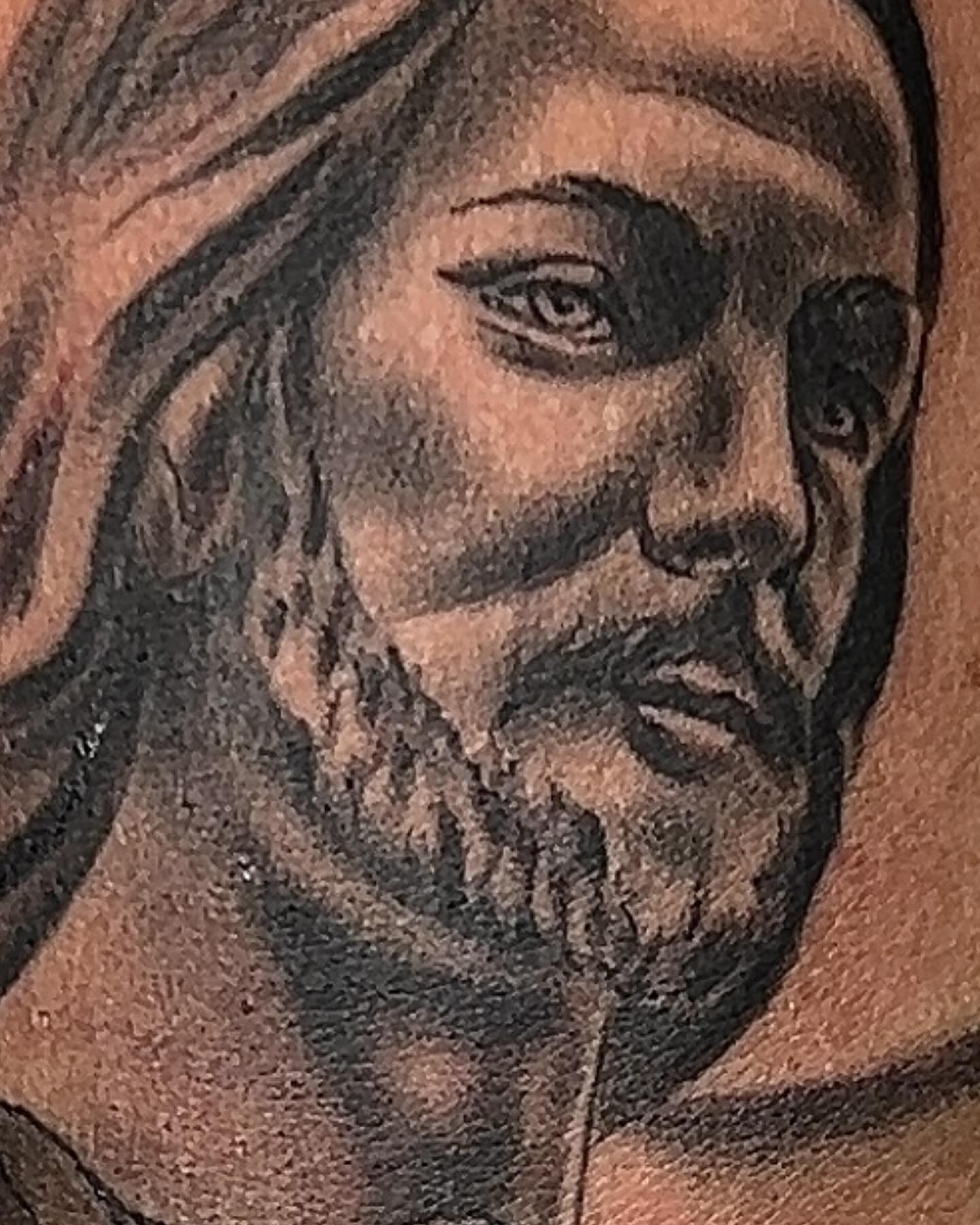 Religious figure black and grey tattoo on the head by Kevyn Vidal