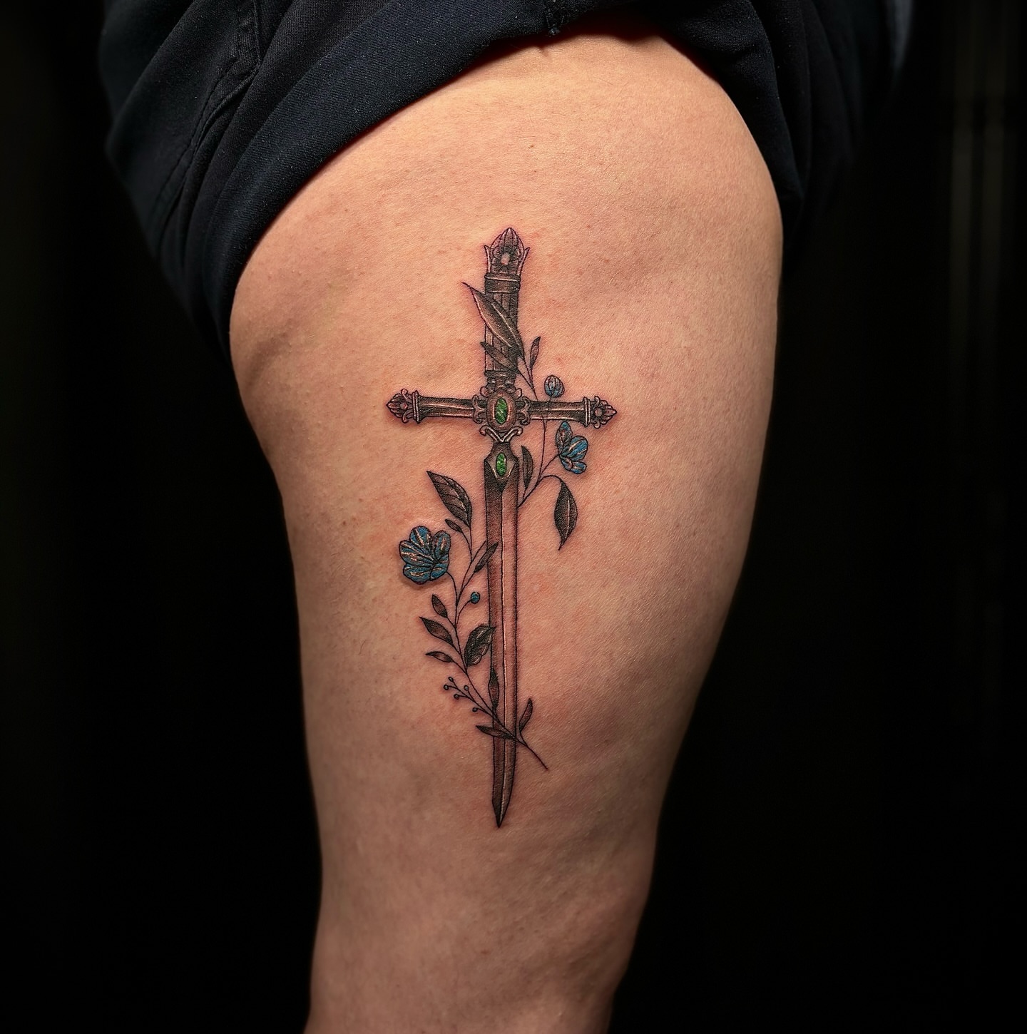 Cross and sword neo-traditional tattoo on the thigh by Las Vegas Tattoo Artist