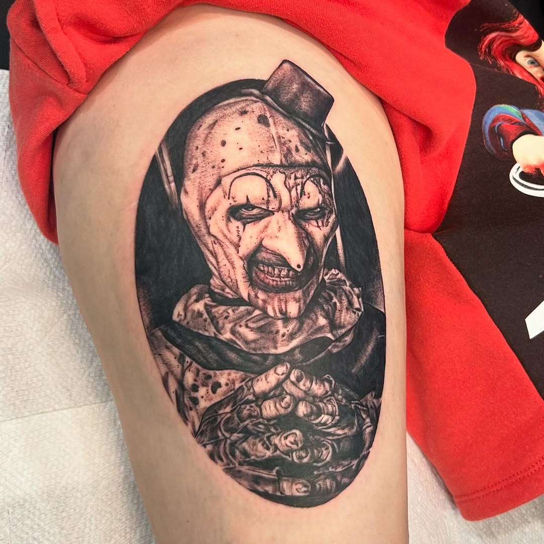 Art the Clown portrait realism tattoo on the thigh by Kim Goff - Special K