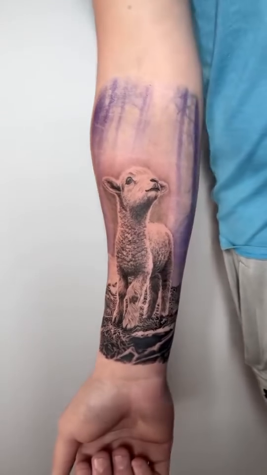 Lamb in a forest realism tattoo by Charlie