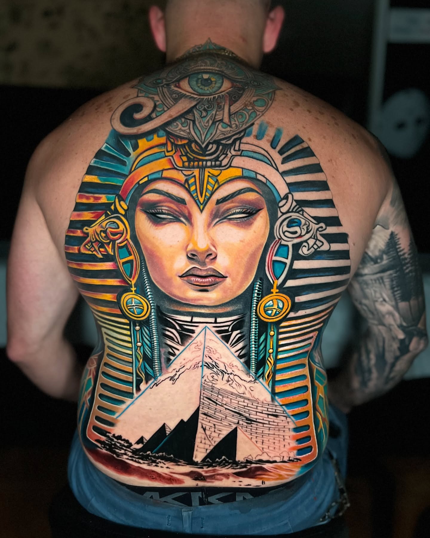 Pharaoh illustrative tattoo on the back by Yanko Reyes