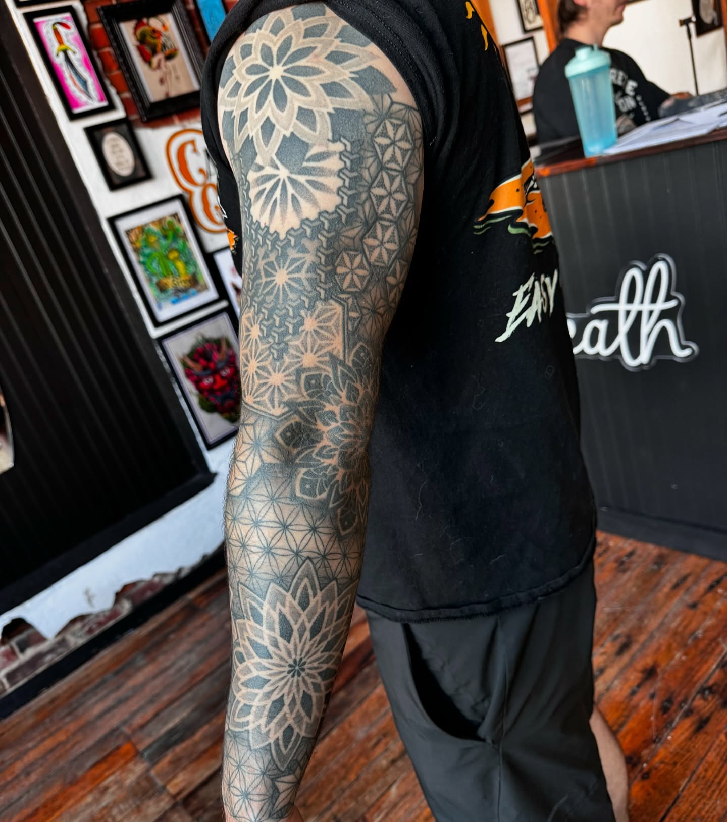 Geometric patterns geometric tattoo on the upper arm by kenneth nash