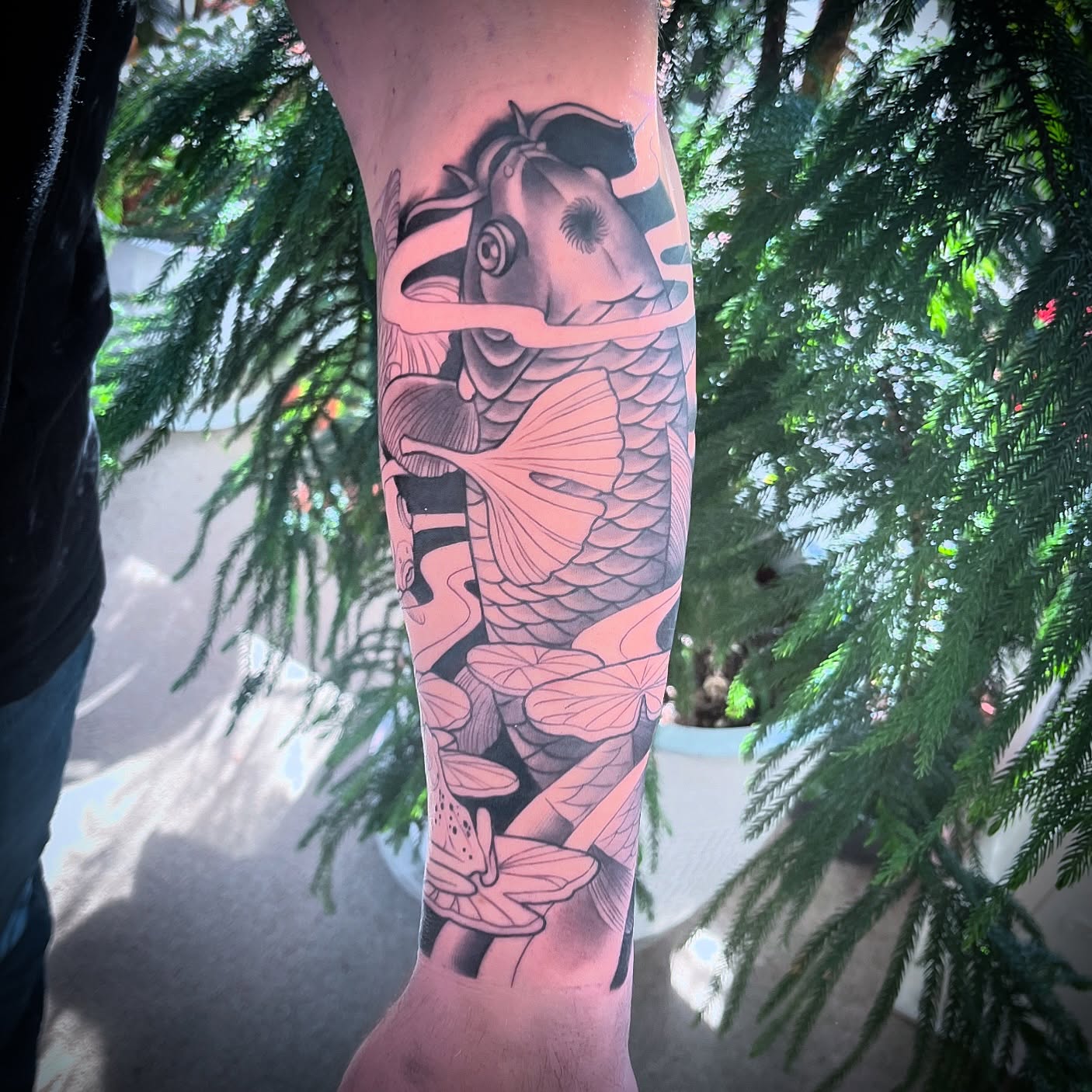 Koi fish and lotus japanese irezumi tattoo on the forearm by Angelique Sanders, Tellico Plains, Tennessee