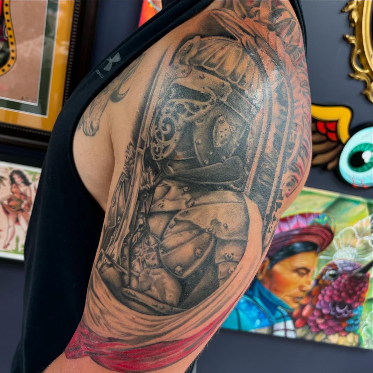 Warrior realism tattoo on the upper arm by Amy Kolton