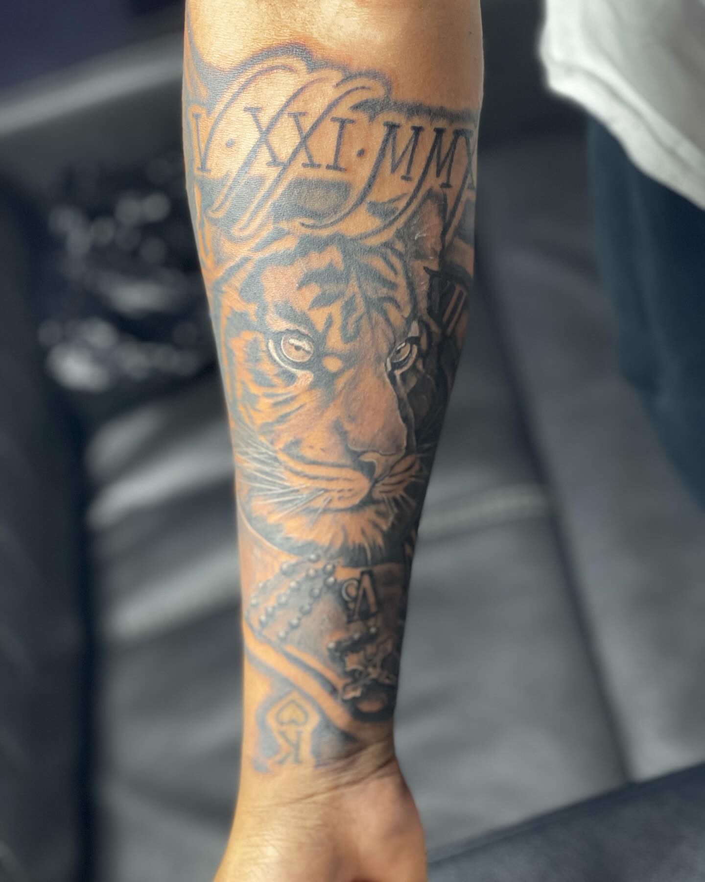 Tiger realism tattoo on the forearm by Azaan (Zanye), Birmingham, Alabama