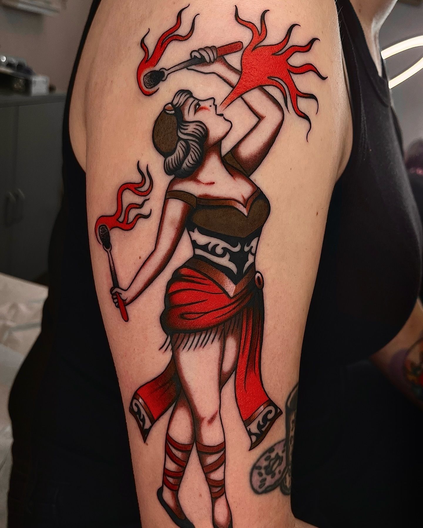 Fire spinner American traditional tattoo on the thigh by 𝒟𝑜𝓃𝓃𝒶 𝒥 ࿏ Portland Tattoo Artist