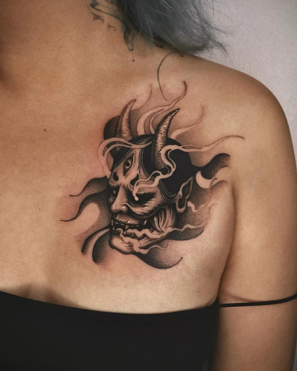 Demon mask dark realism tattoo on the shoulder by Minho