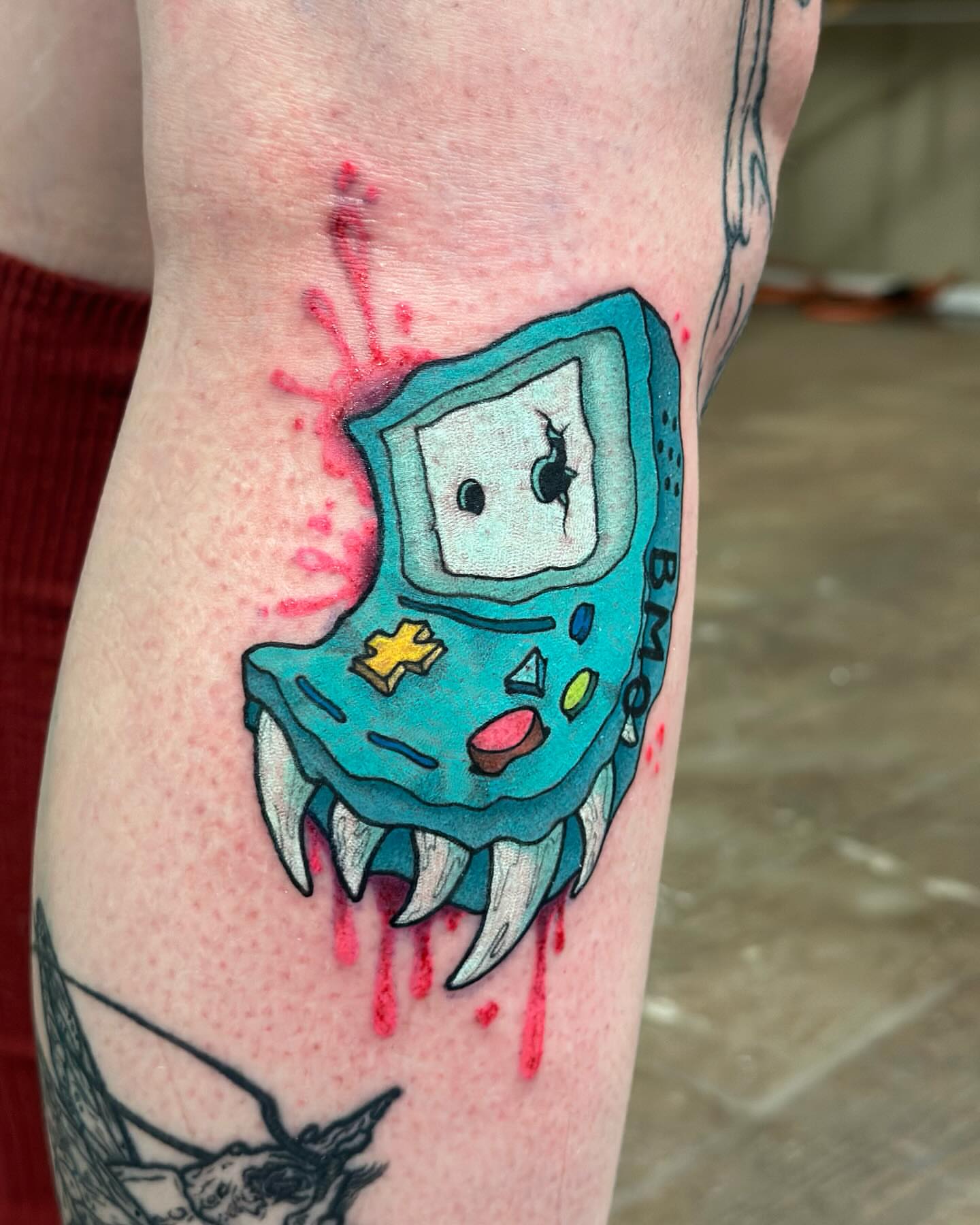 BMO dotwork tattoo on the forearm by Izabelle Inks